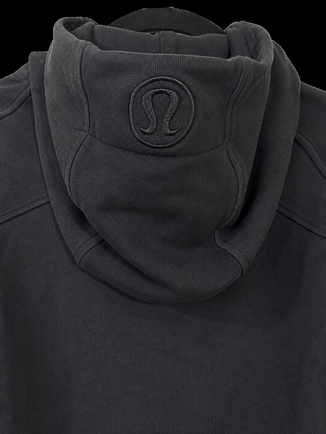 Lululemon black hoodie embroidered logo detail on hood