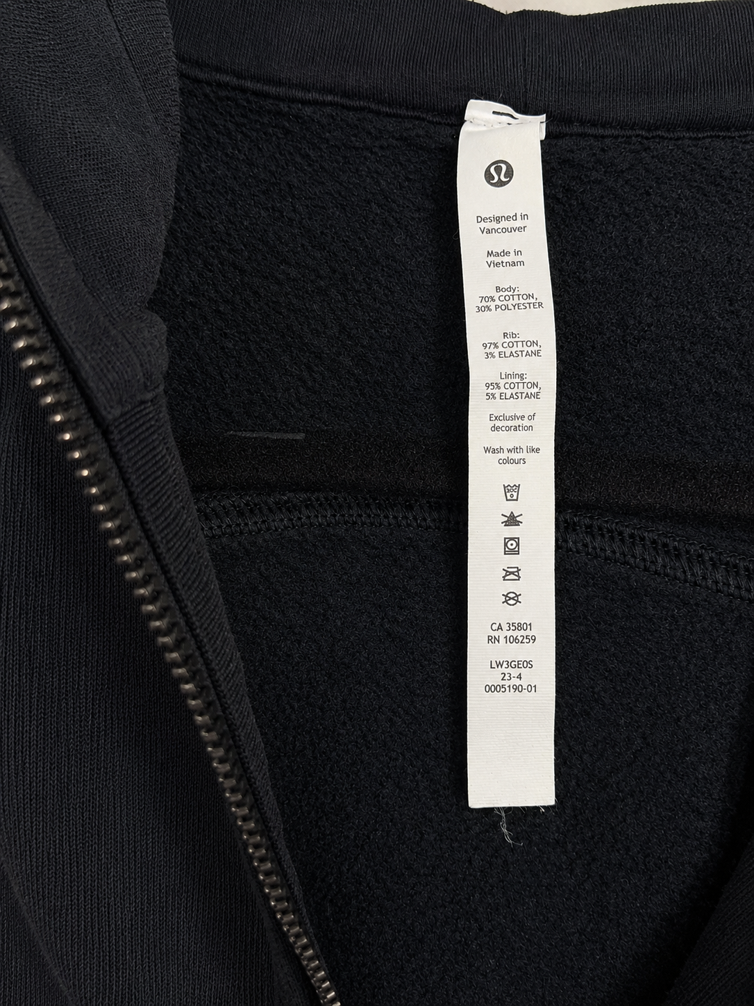 Lululemon black cropped hoodie size 8 fabric and care tag