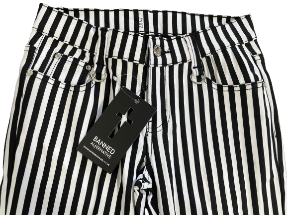 Black and white vertically striped denim jeans with a black hangtag reading 'DANNED ALTERNATIVE' on a white background.