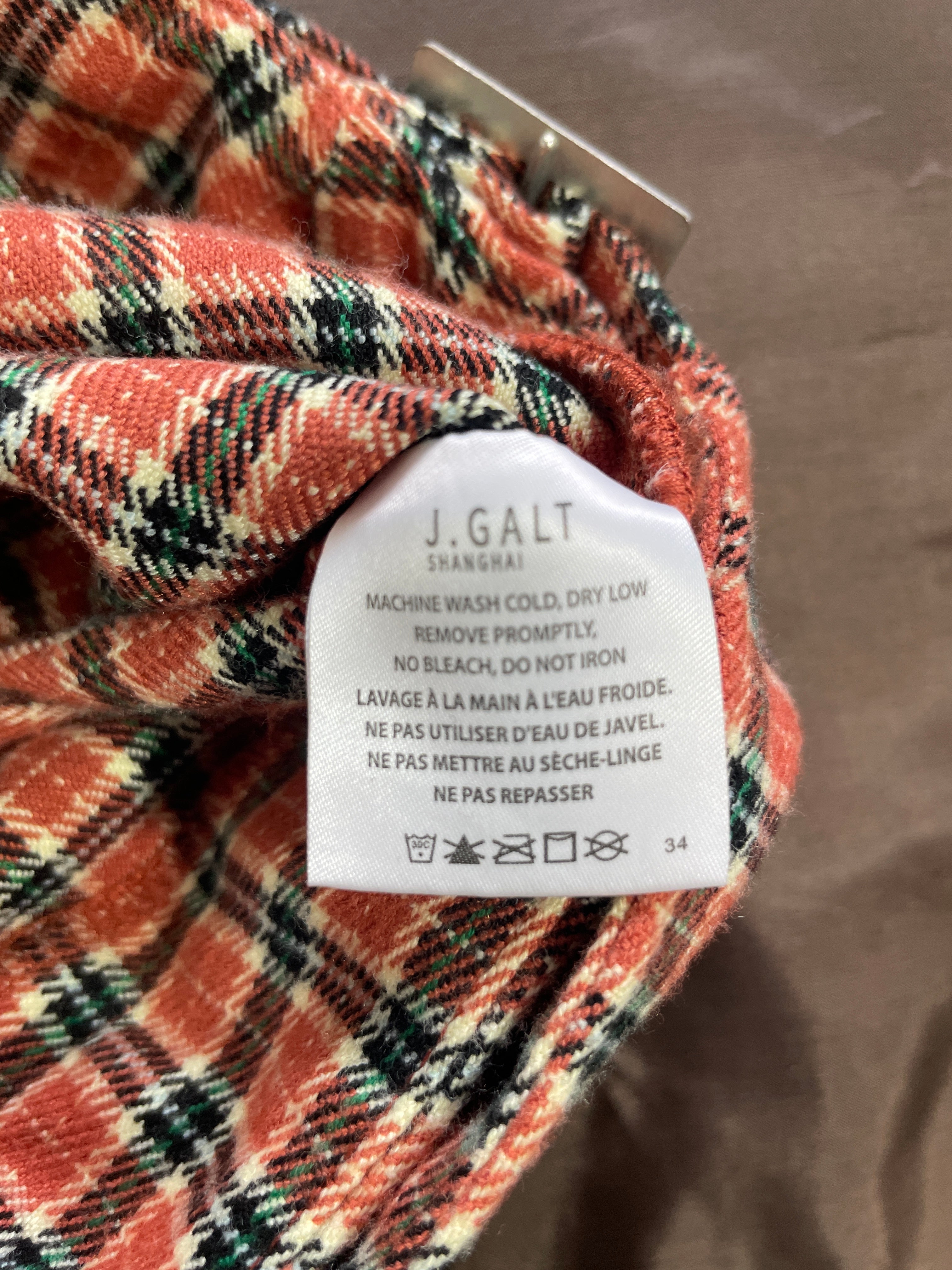 - Small J. Galt red cream black green plaid buckle mini skirt