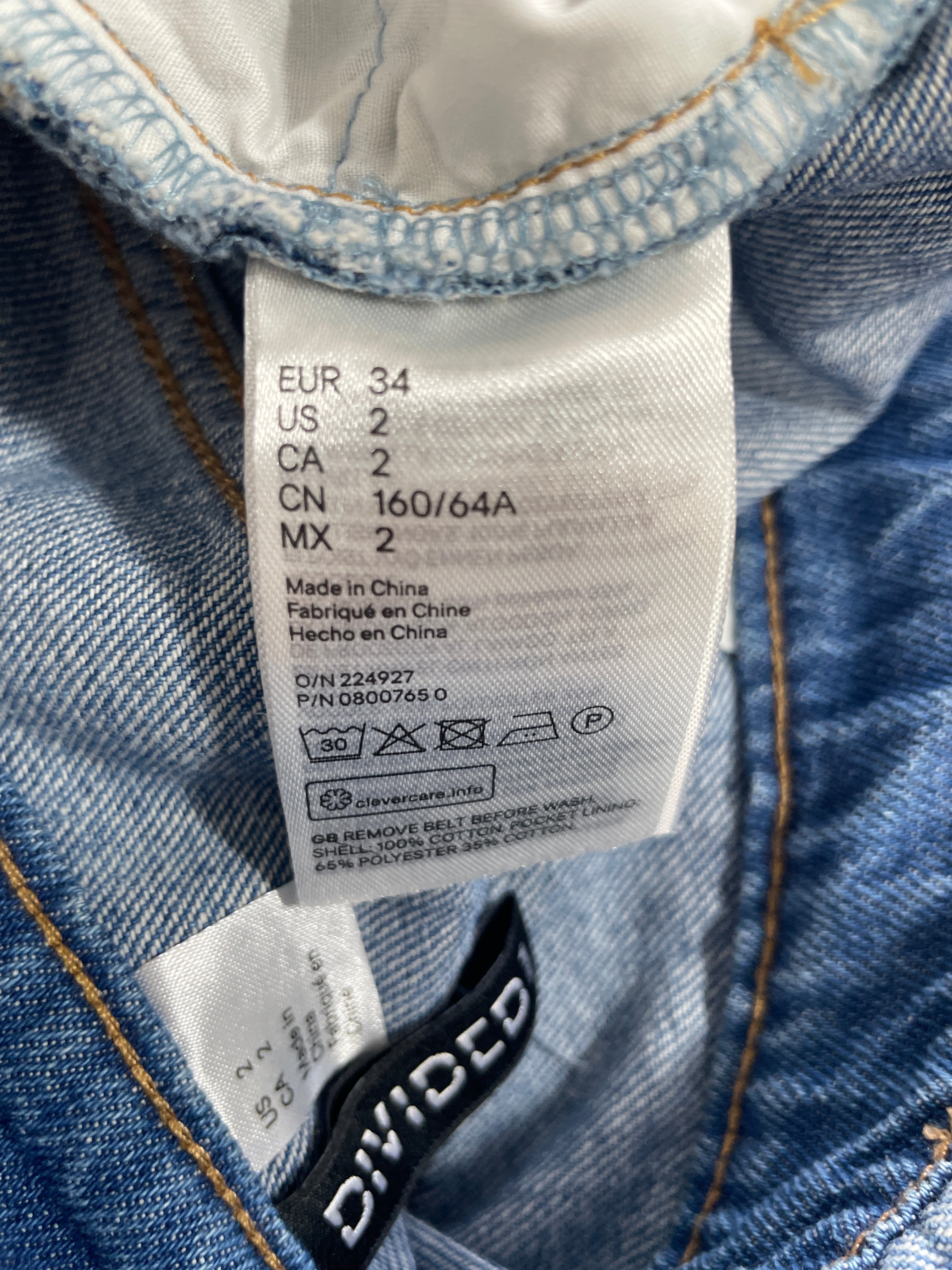 - Size 2 H&M Divided 100% cotton blue denim skirt care label