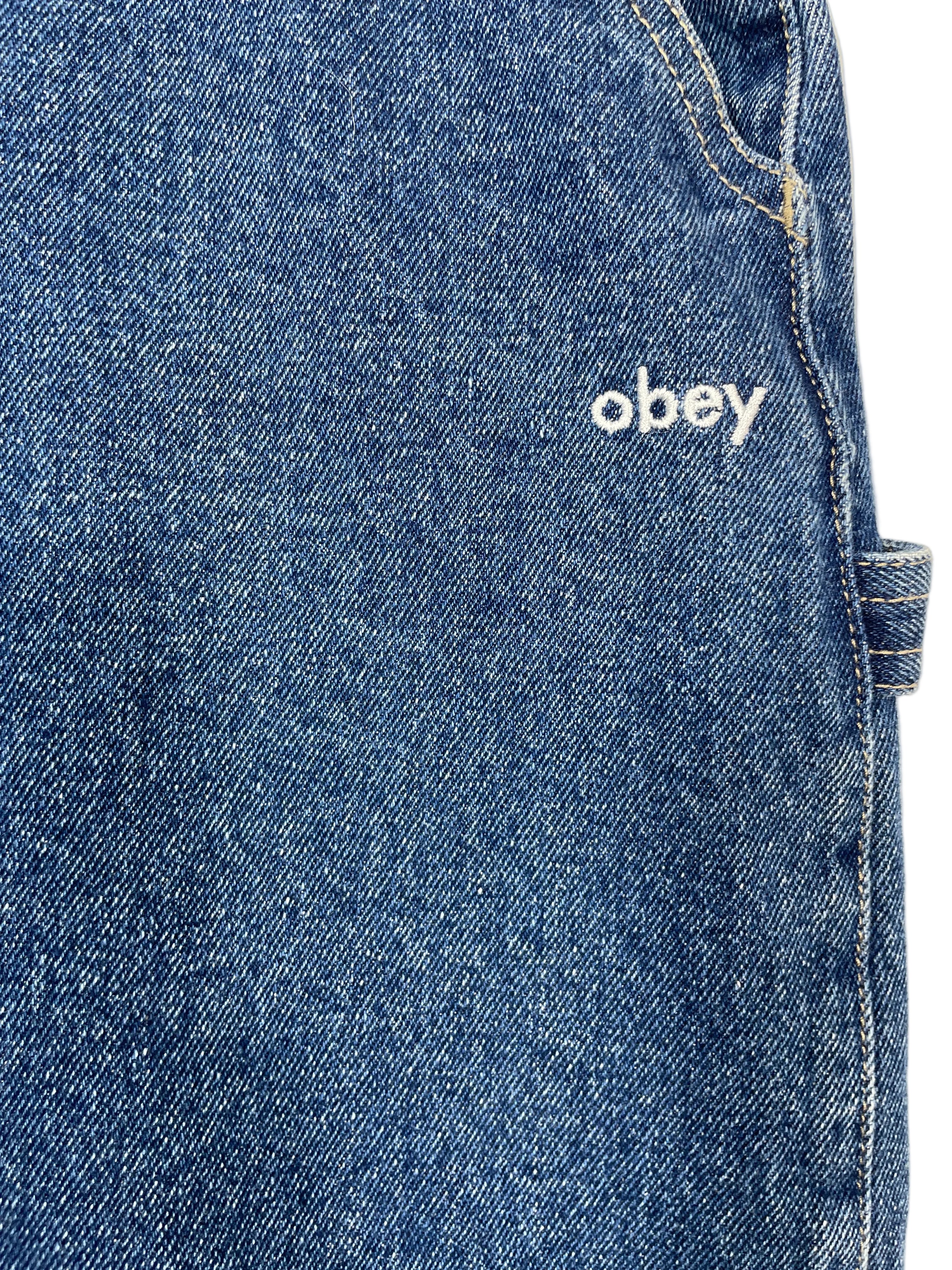 Size 32 OBEY blue denim maxi skirt white embroidered front logo detail