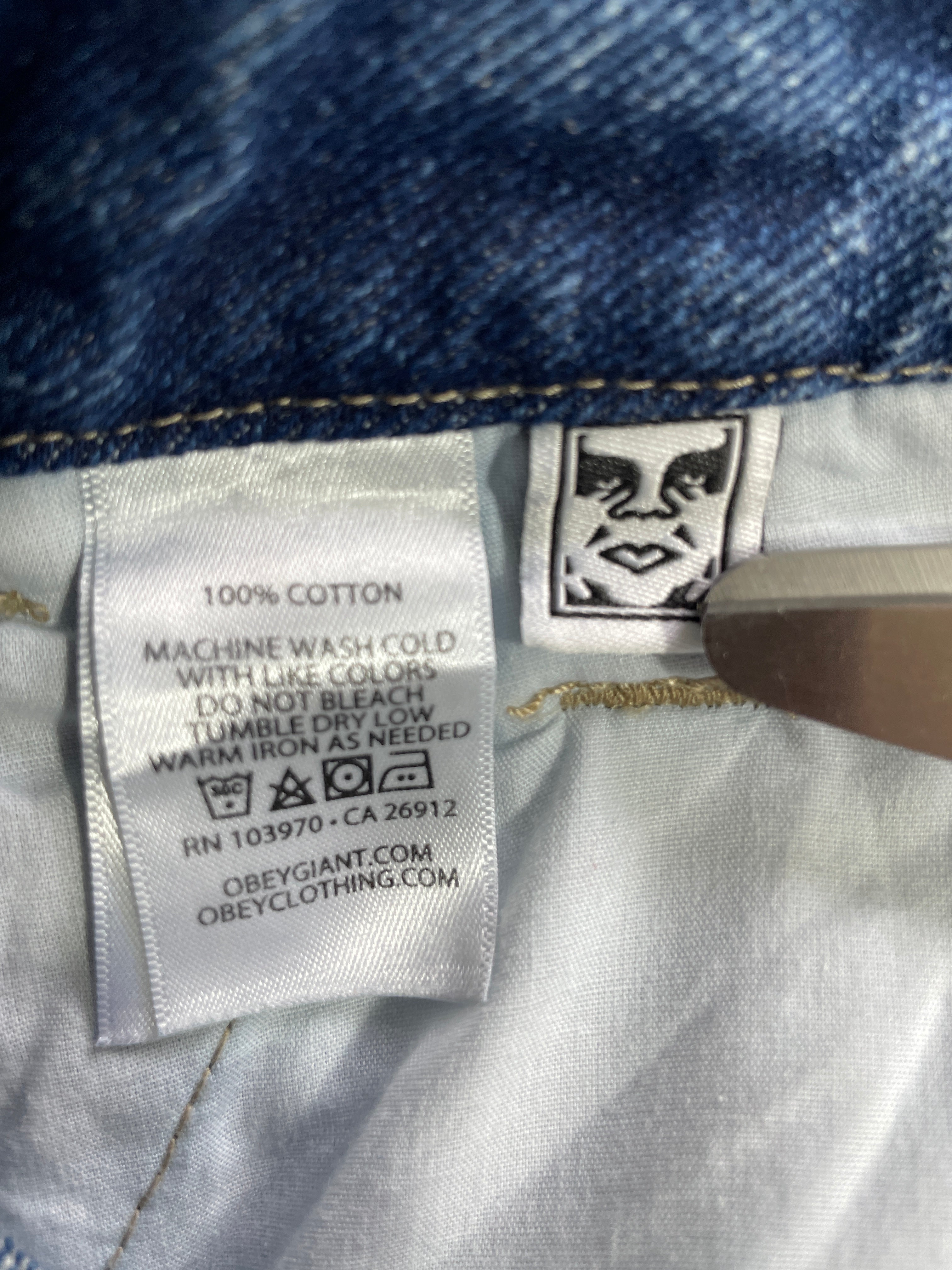 Size 32 OBEY blue cotton denim utility skirt fabric care label