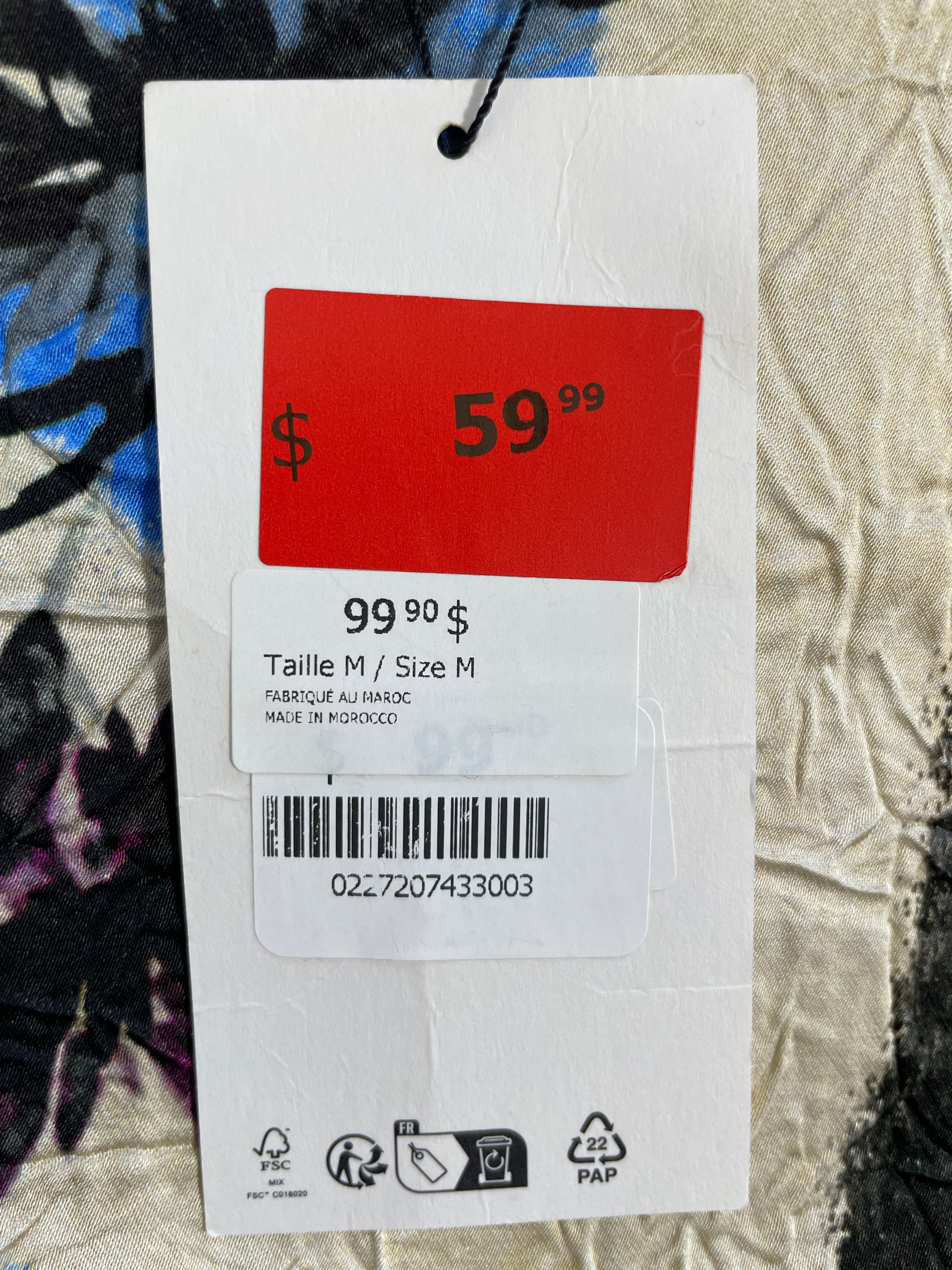 Zara original retail tag showing size Medium and $99.90 price