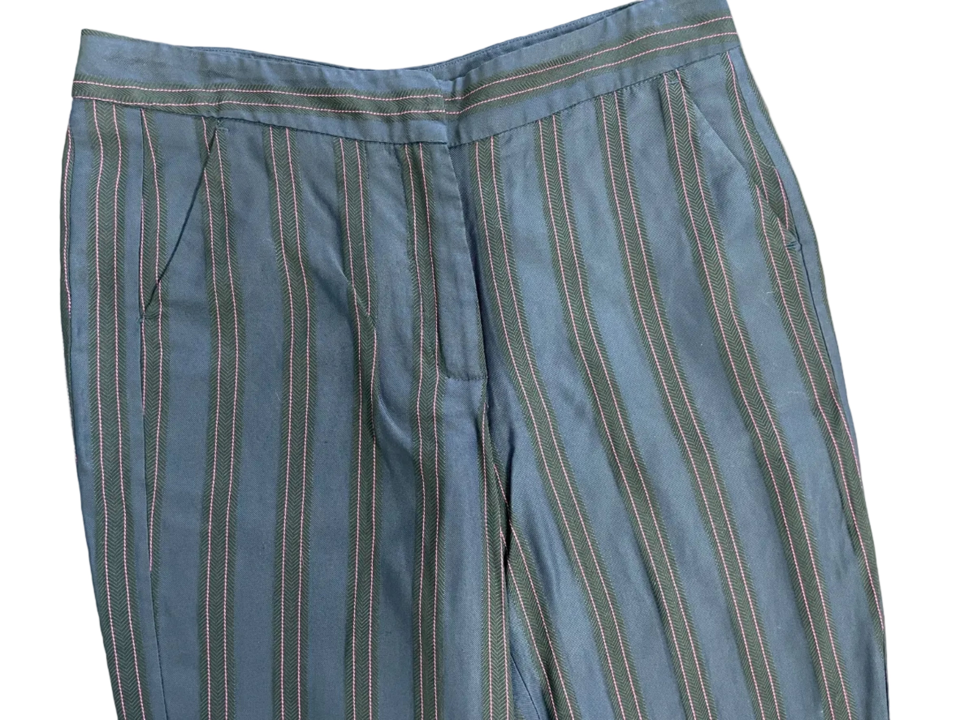 Close-up of Claudie Pierlot navy pinstripe trousers showing waistband and tailored construction
