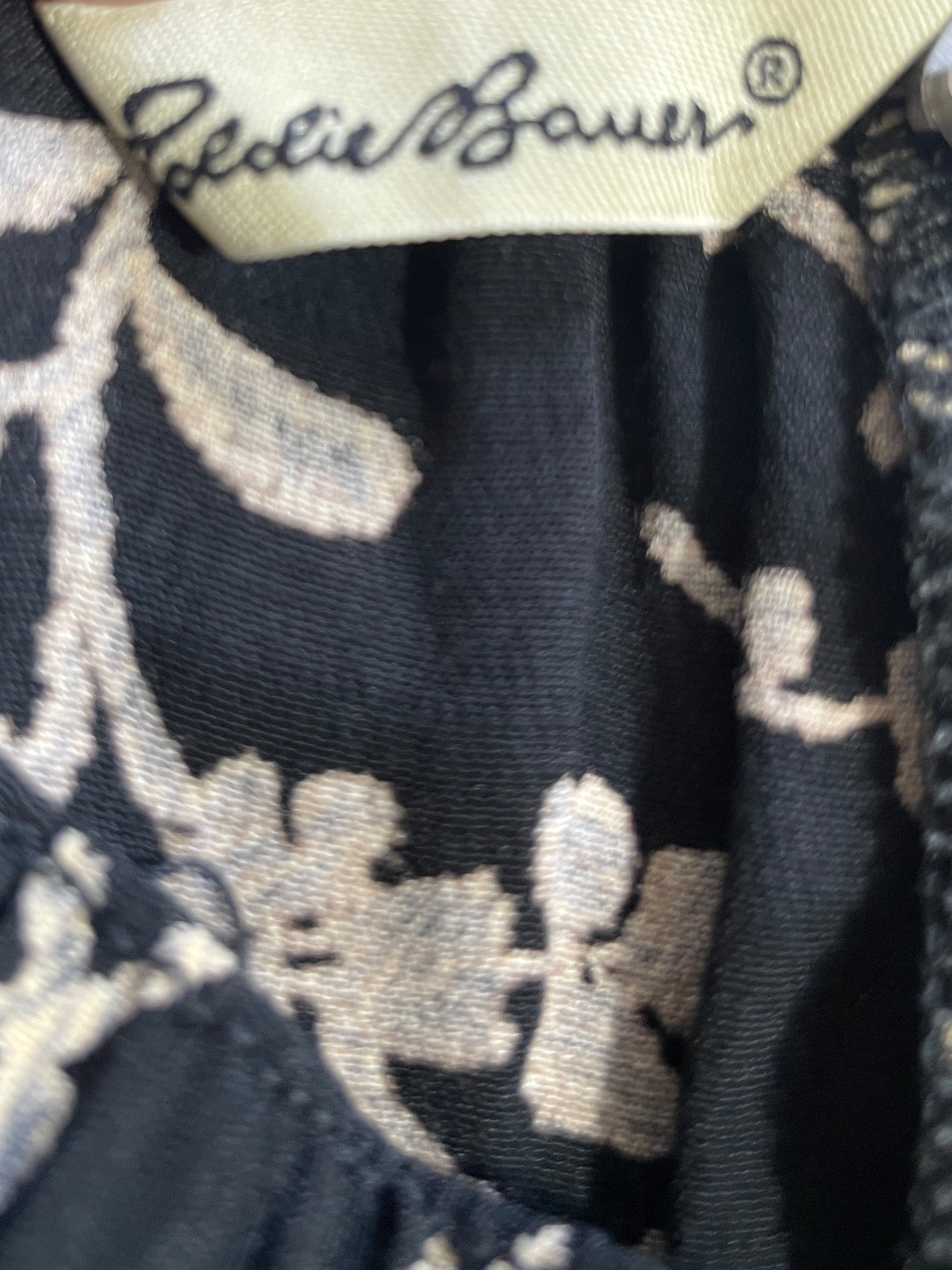 Eddie Bauer brand label on black cream floral rayon maxi skirt