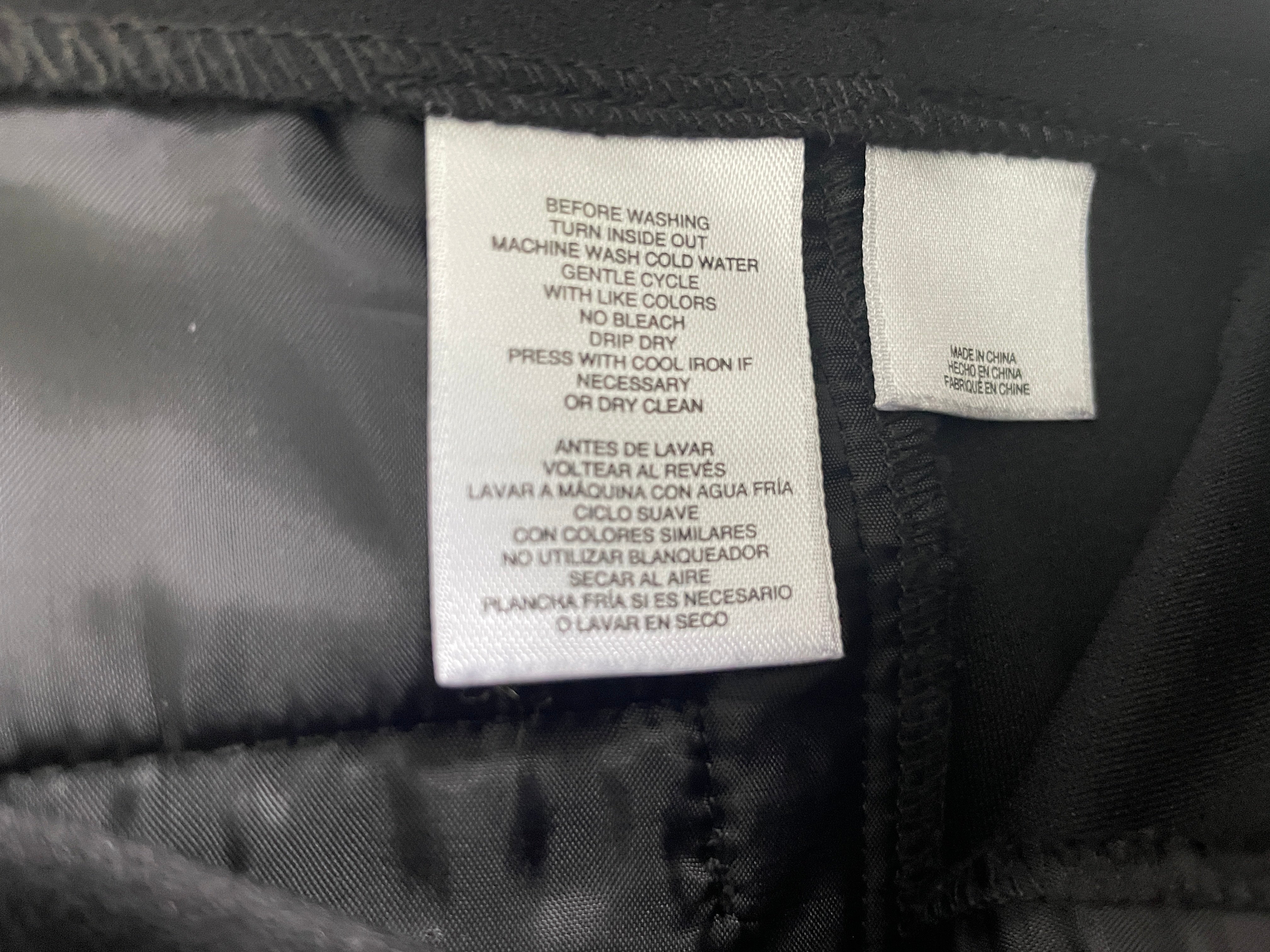 Anne Klein black dress pants interior care instruction label