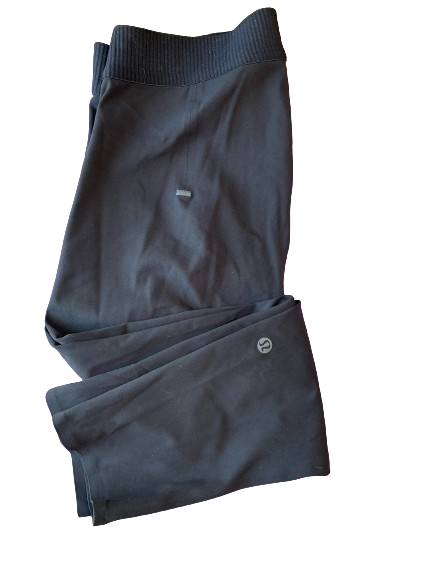 Lululemon Black License To Train Tight 21" in a folded position showcasing the interior pockets and silicone grips on the waistline.