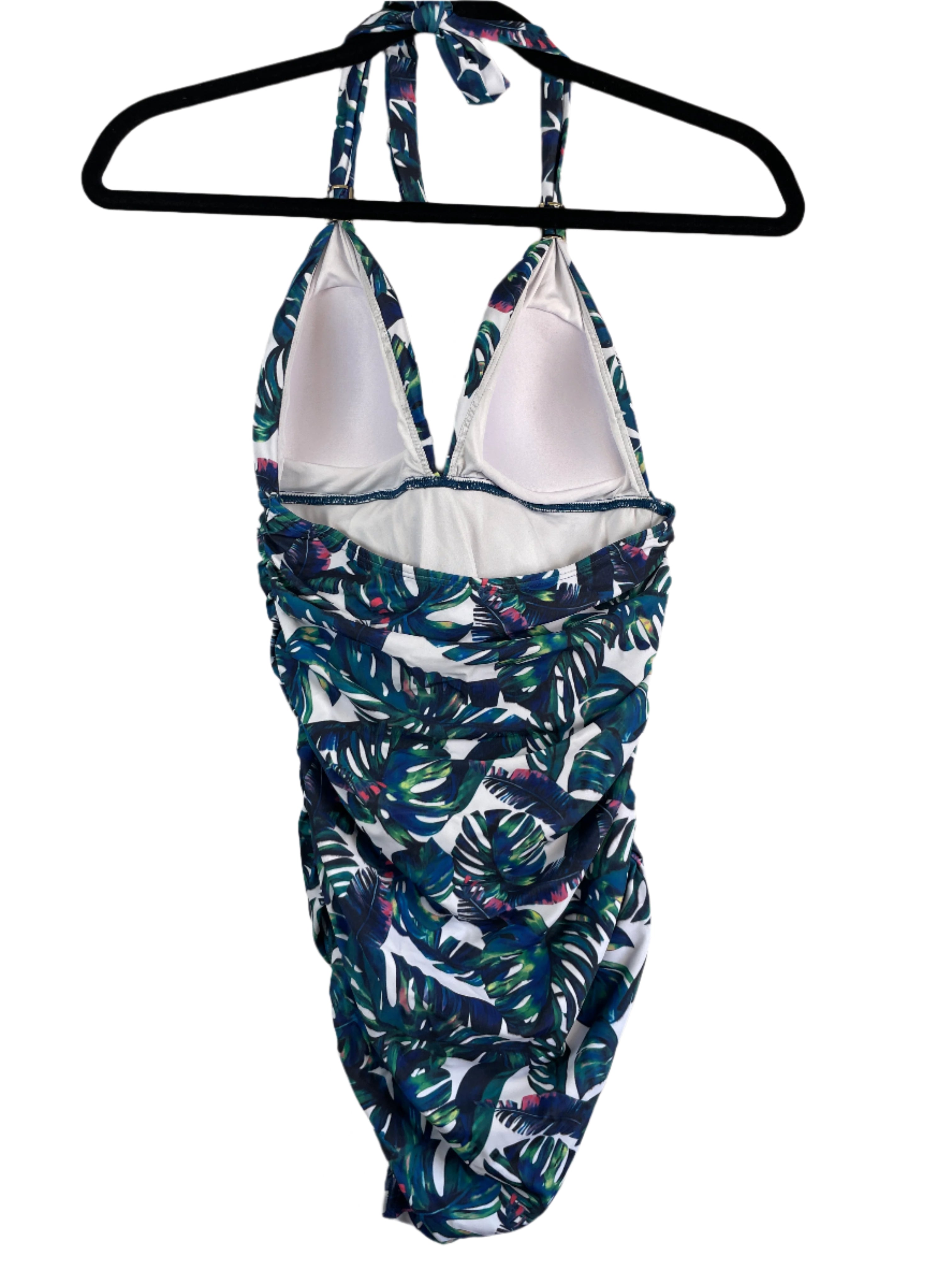 back view of a tropical leaf print one-piece swimsuit with halter neck and padded cups, size small.