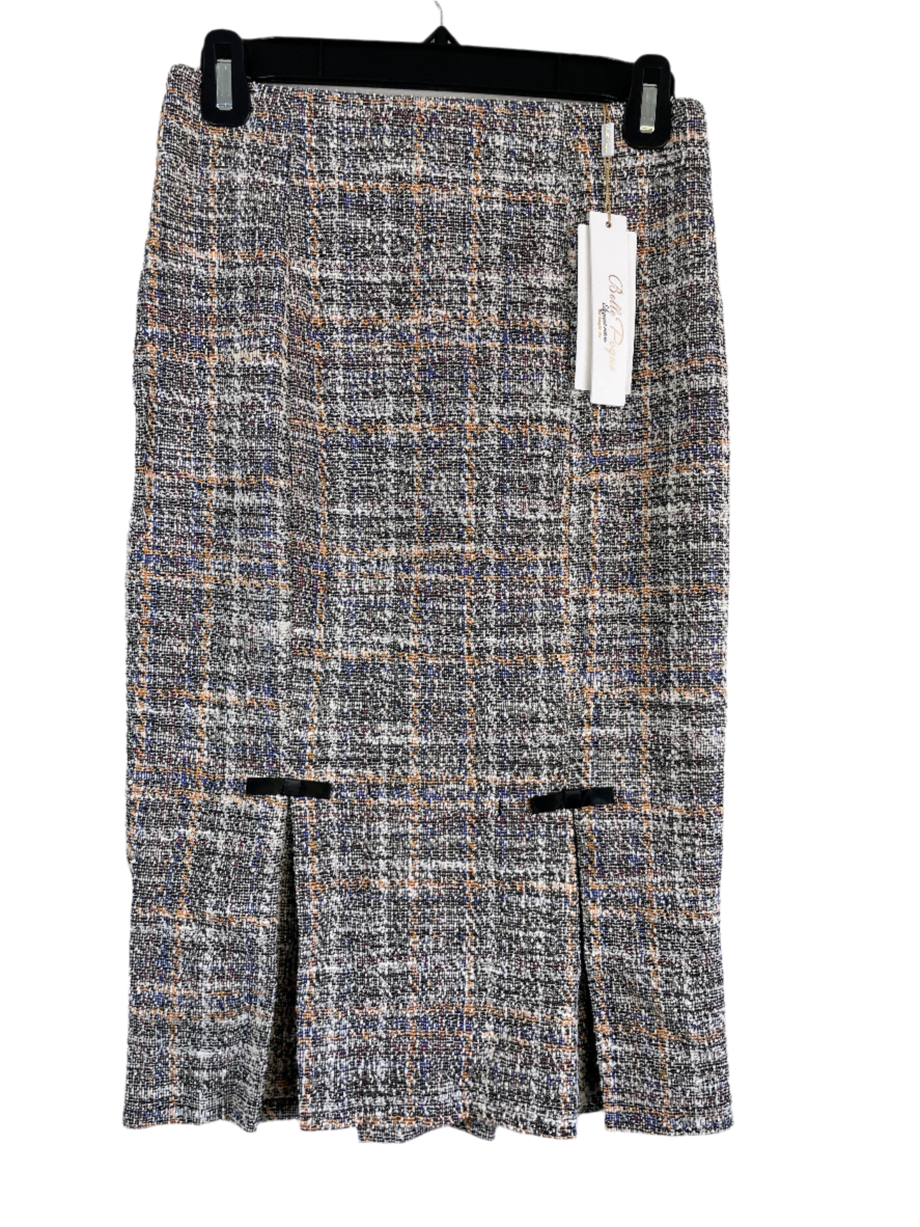 Beige and multicolour Belle Pogue pencil skirt with satin bow detail, size small, displayed flat against a wall.