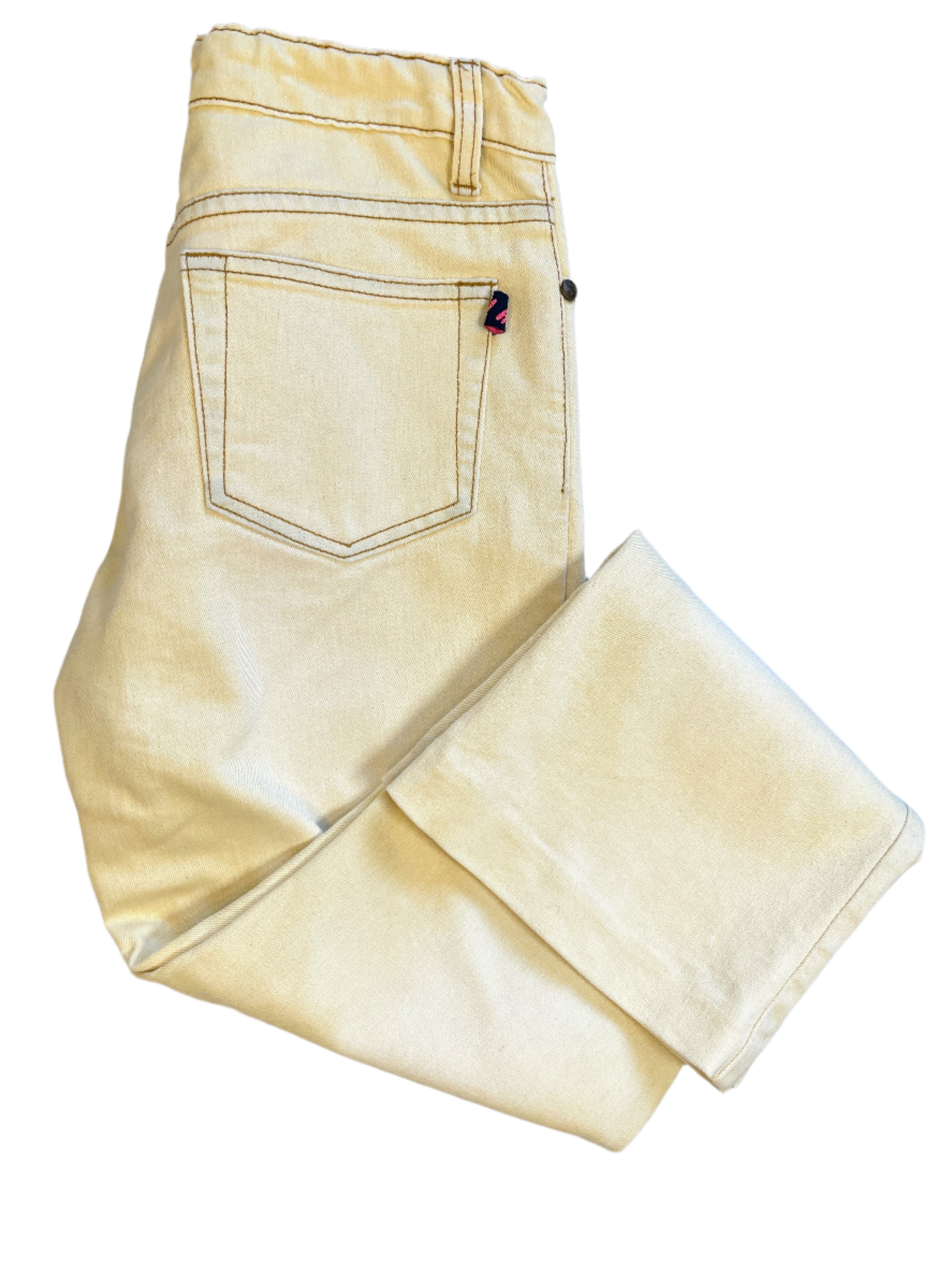 Cream W.M.Y.H. jeans with brown floral bead embroidery on front, size 26, laid flat