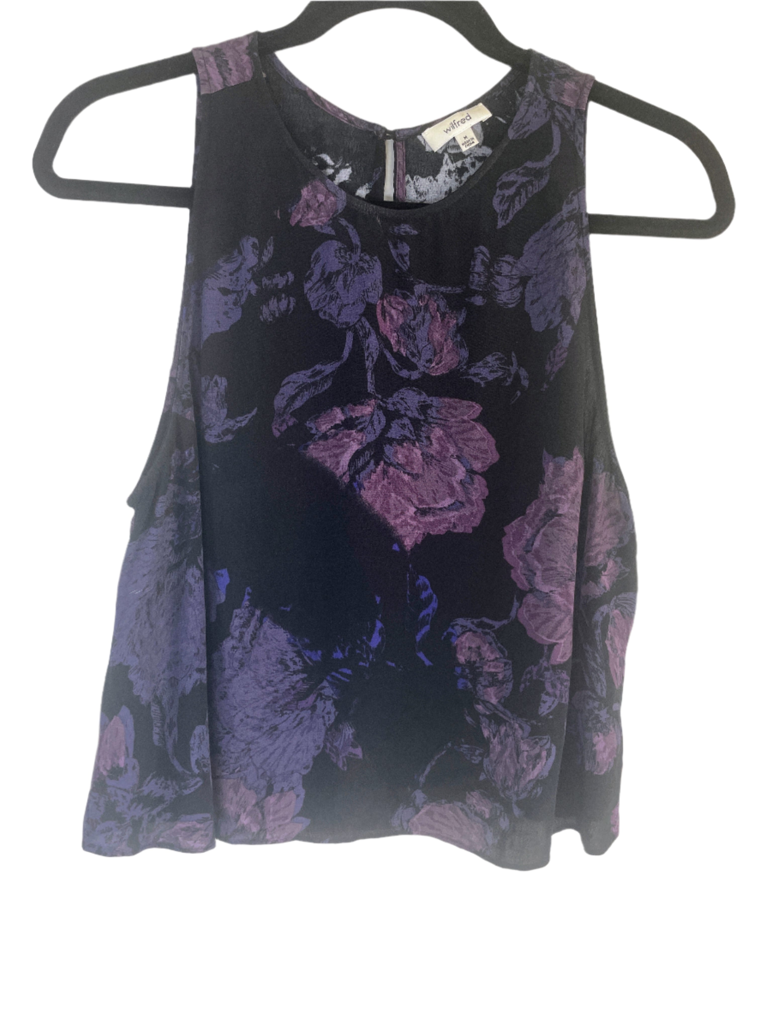 Front of Wilfred sleeveless blouse with purple floral print on black background, size medium