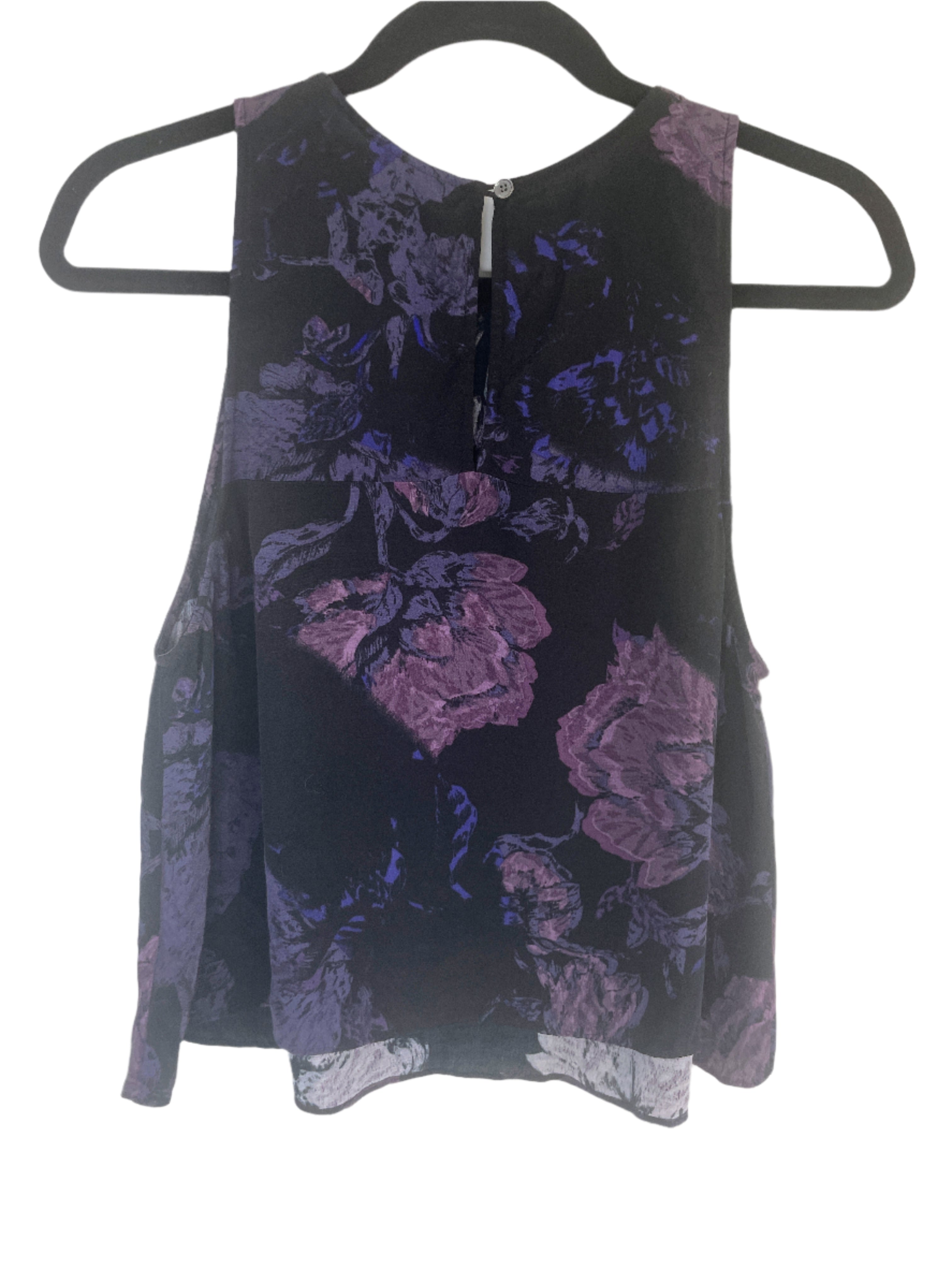 back of Wilfred sleeveless blouse with purple floral print on black background, size medium