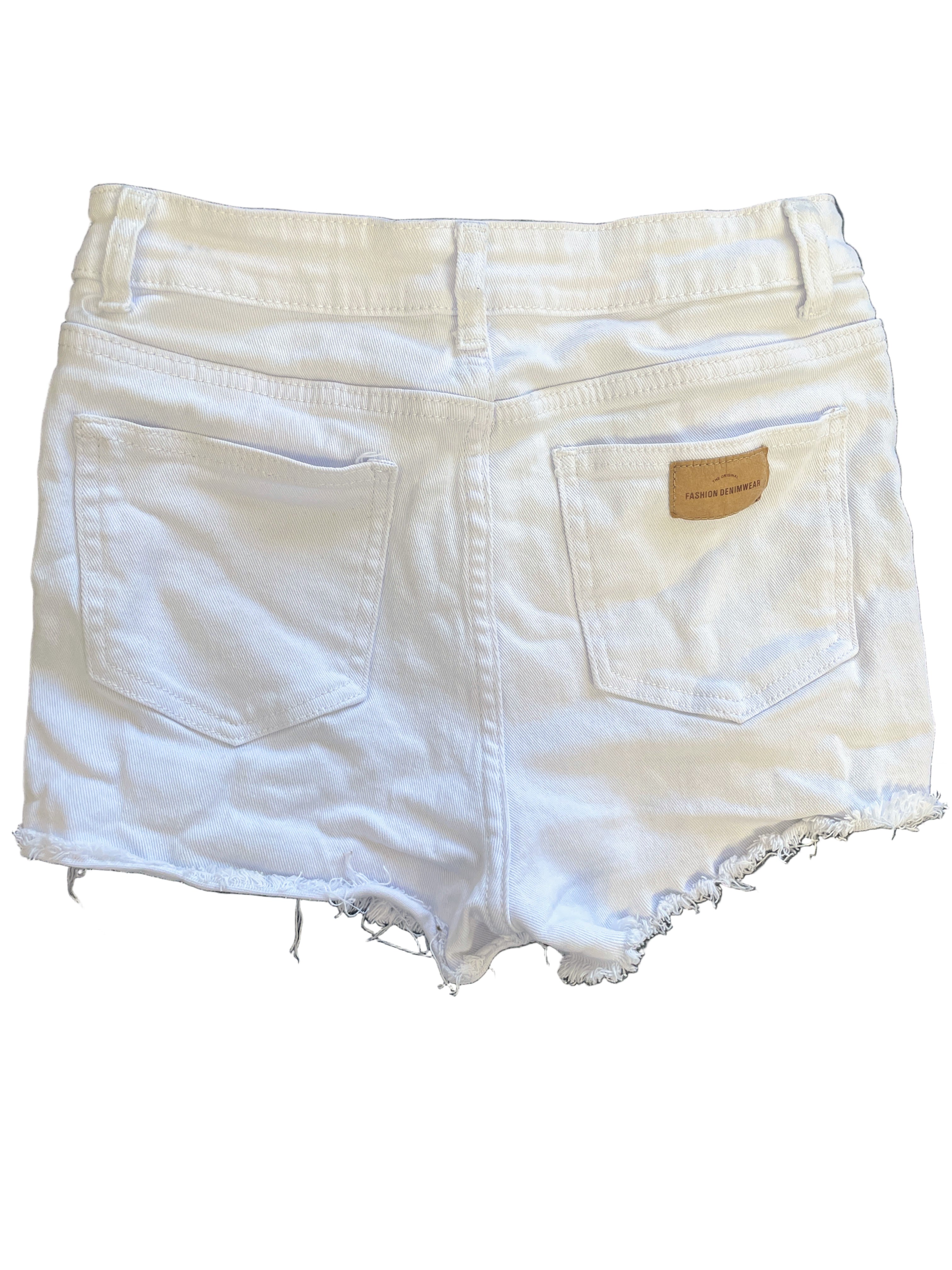 Front view of SHEIN white distressed denim shorts with ripped details and frayed hem