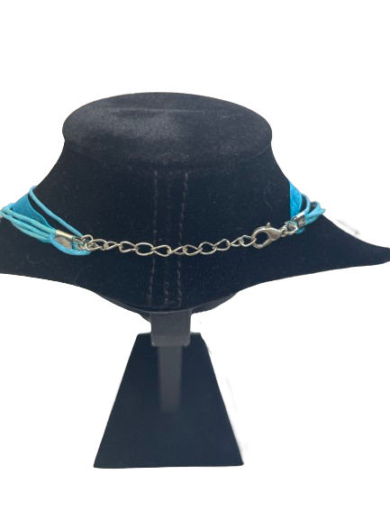 Back view of silver filigree statement necklace with lobster clasp and adjustable chain