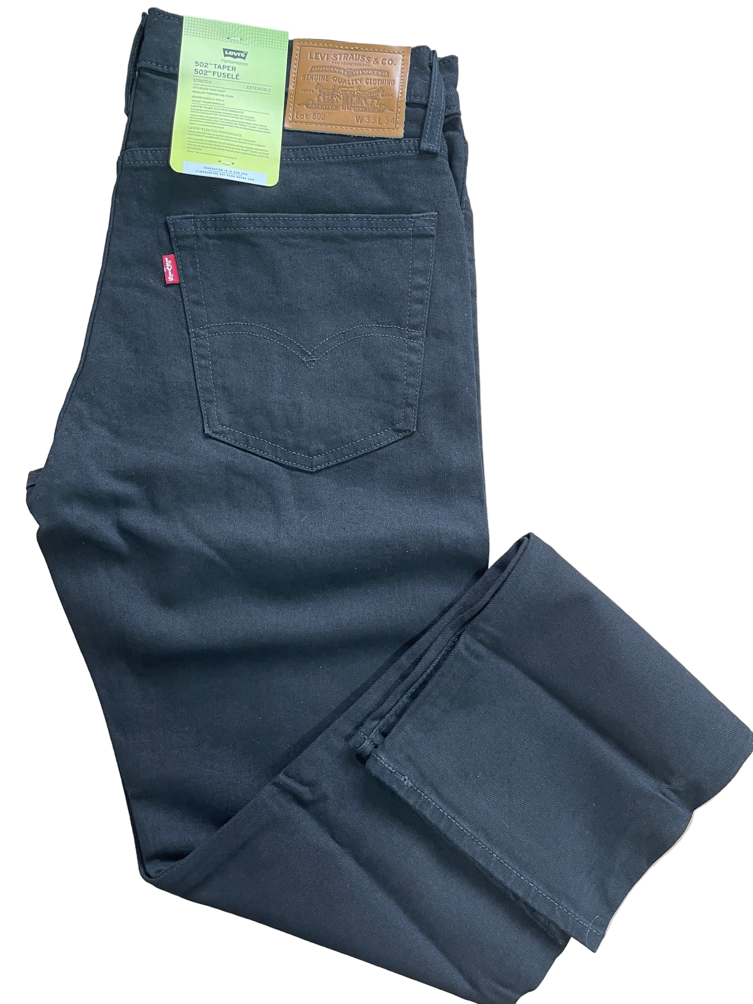 Levi’s 502 Taper men’s jeans in black, size 33x34, stretch fabric with tapered leg, zipper fly, five pockets, leather patch on waistband