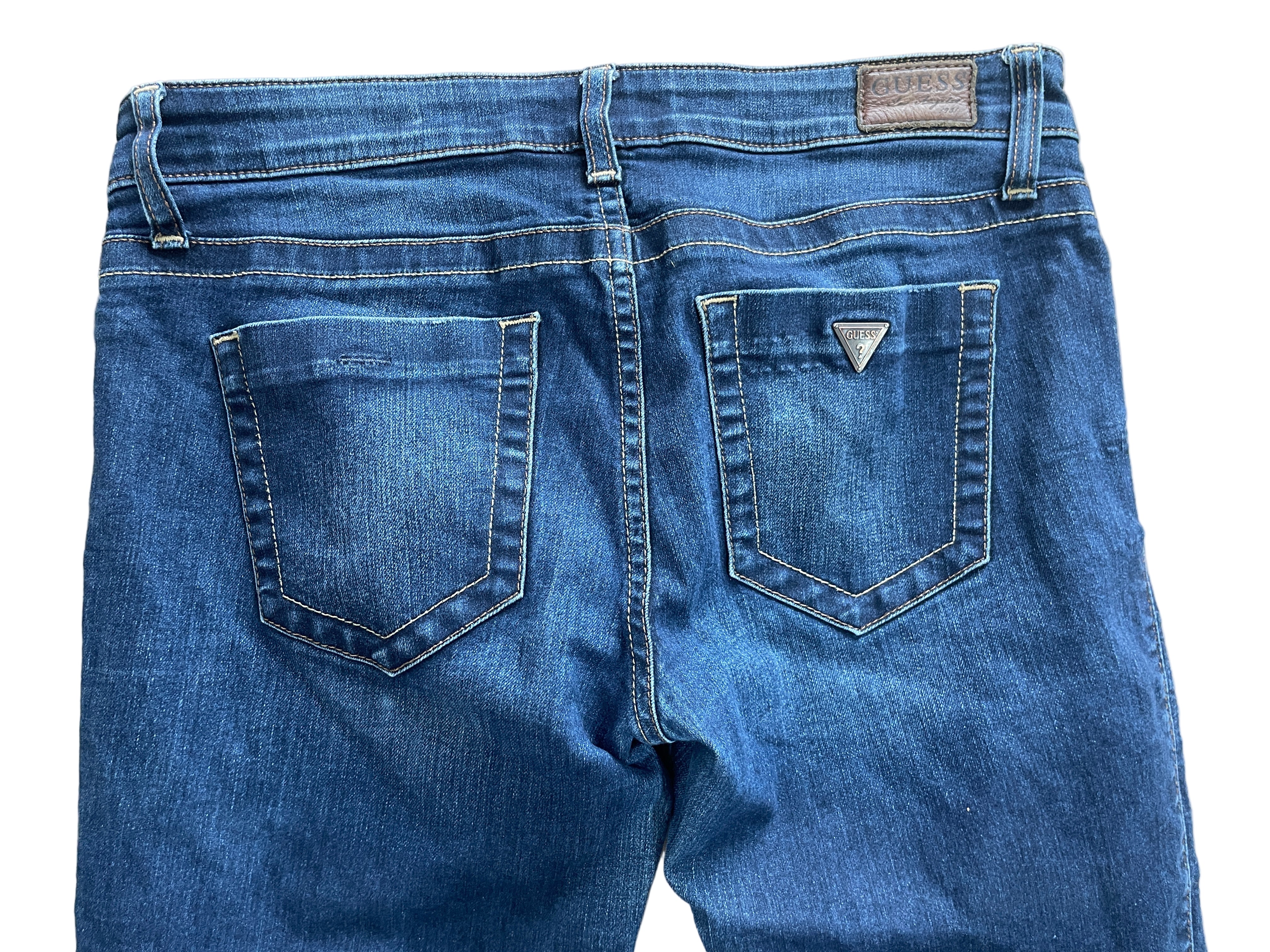 Guess Power Ultra Skinny jeans in dark wash, size 27, back pockets feature Guess logo