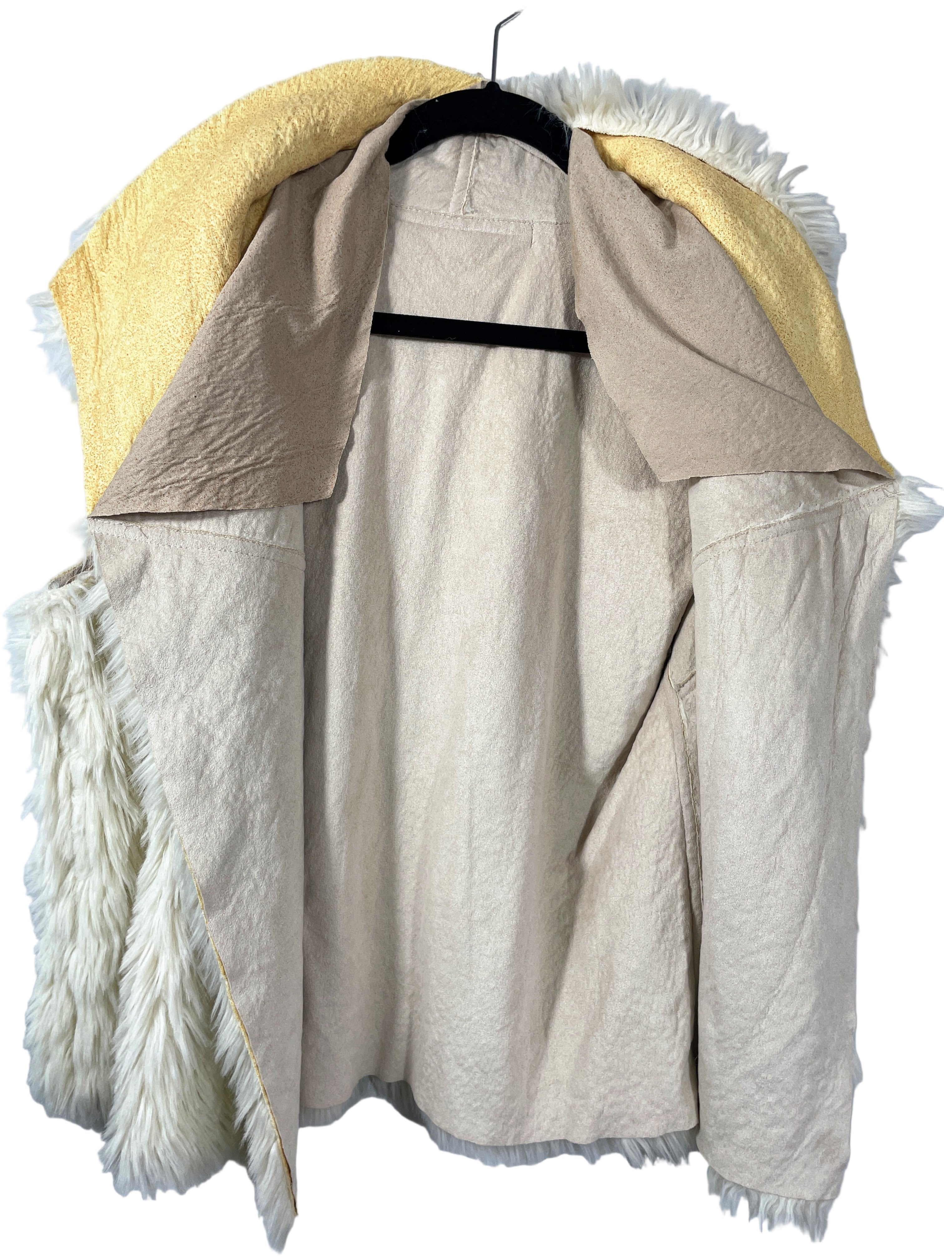 Cream faux fur vest inside lining view