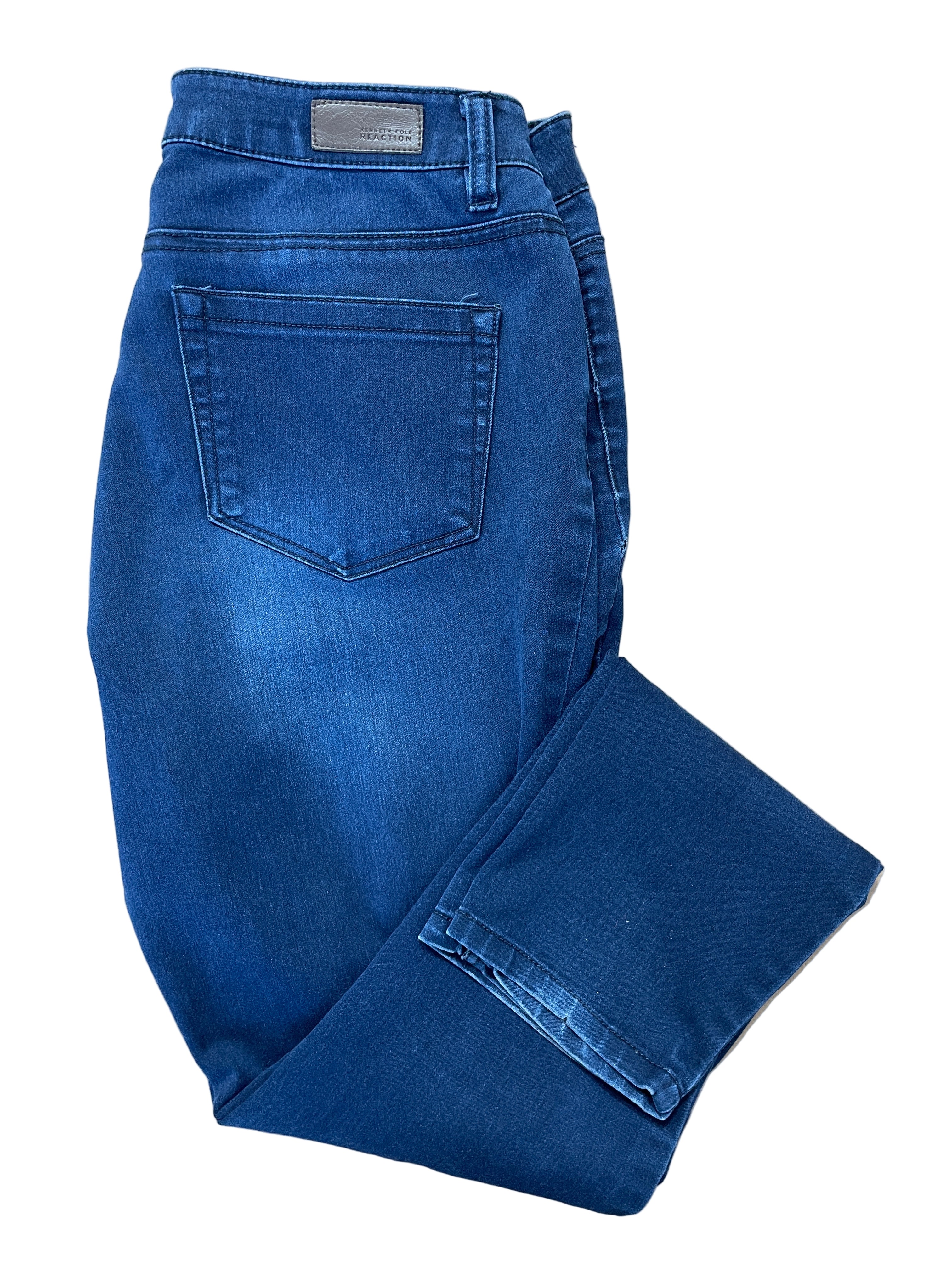 Folded view of Kenneth Cole Reaction skinny jeans in dark wash