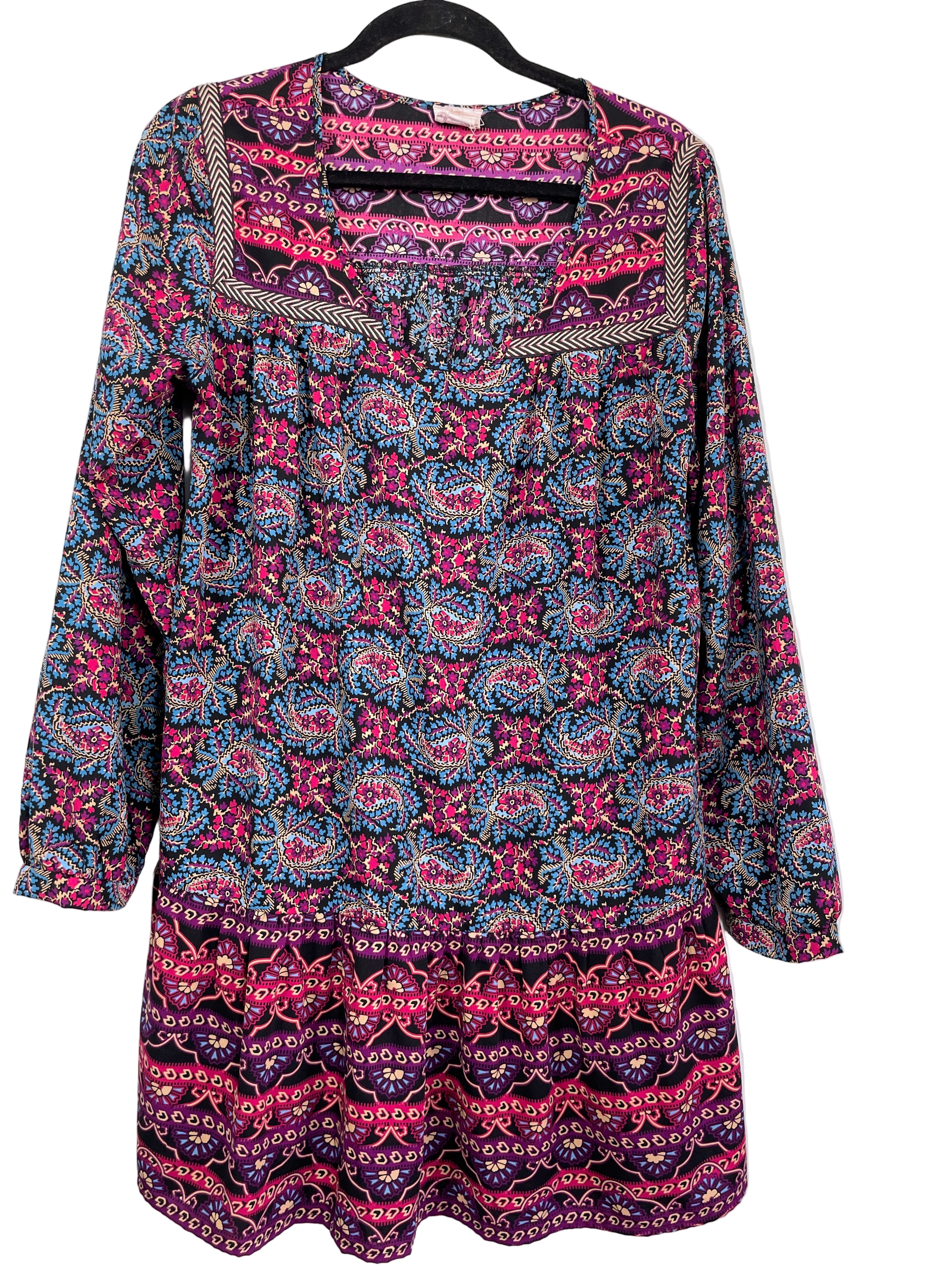 Front view of One Clothing boho print tunic dress in purple, pink, and blue