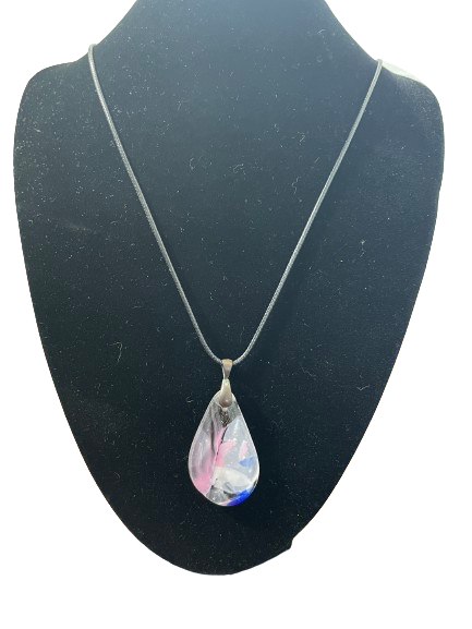 Teardrop clear pendant necklace with pink and blue accents on black cord