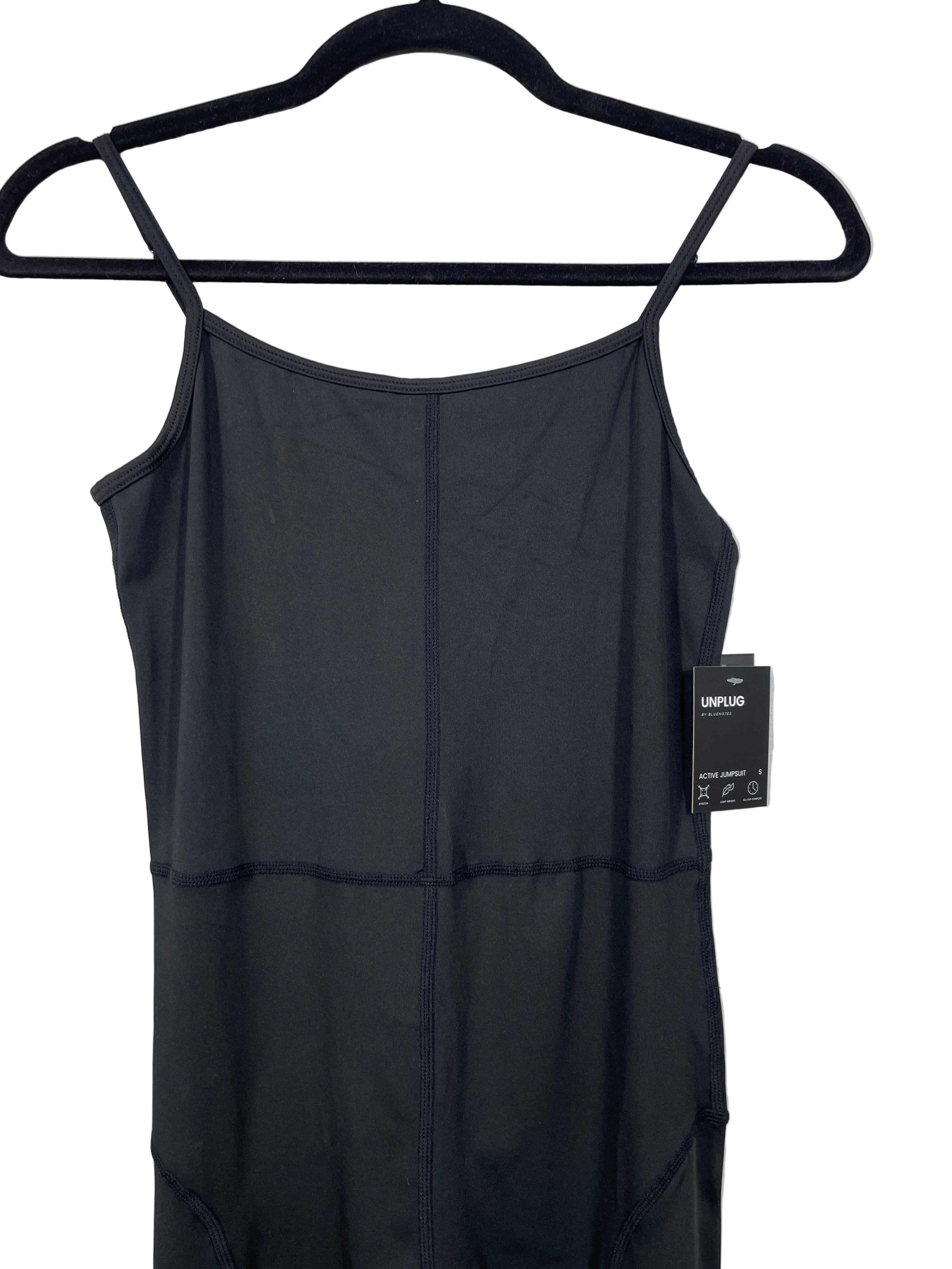 Bluenotes Unplug black one-piece jumpsuit close-up of straps and seams