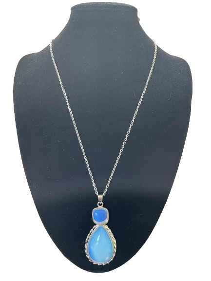 Blue chalcedony teardrop pendant necklace on silver tone chain front view