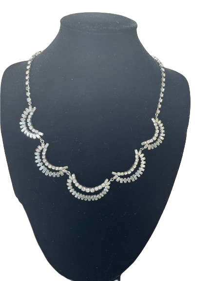Front view of vintage scalloped rhinestone collar necklace on black bust