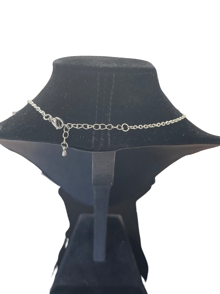 Back view of silver tone necklace showing lobster clasp and extender chain