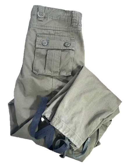 Front of men's olive green tactical cargo pants with drawstring ankles and stirrups.