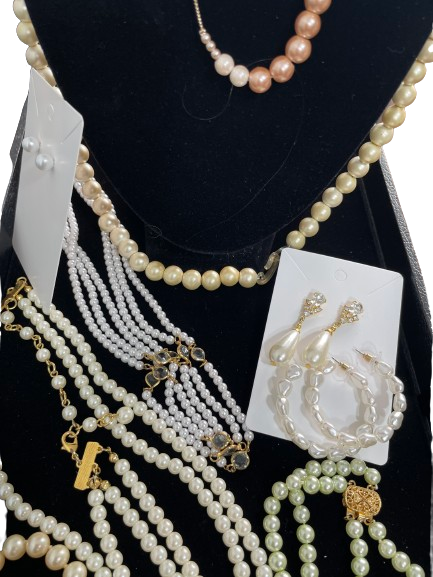Faux pearl costume jewellery collection with necklaces bracelet and four pairs of earrings
