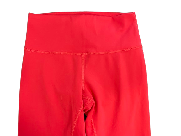 Lululemon orange leggings back waistband and seam detail