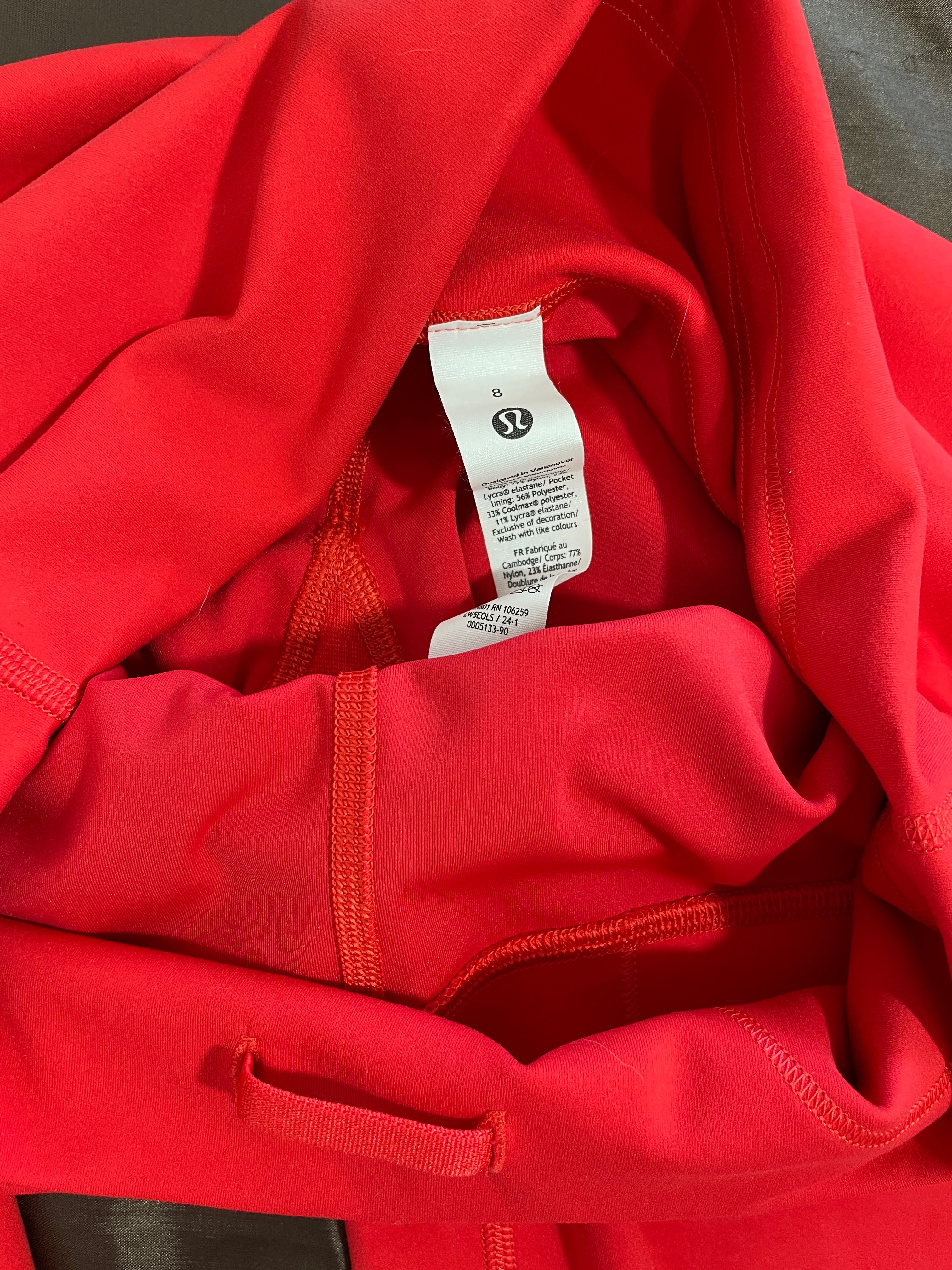 Lululemon size 8 leggings interior tag and drawstring waist detail