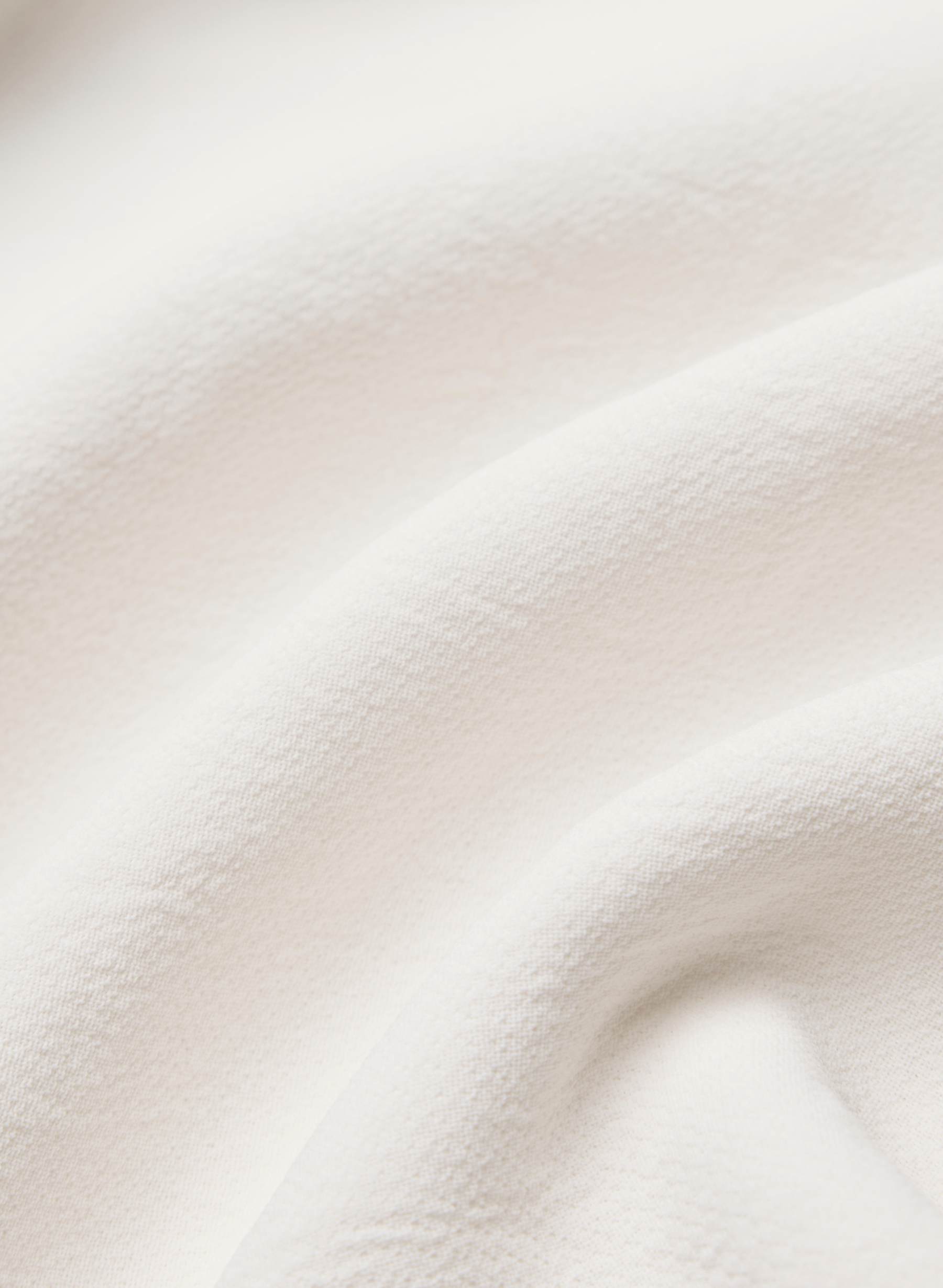 close up of aritzia trench fabric