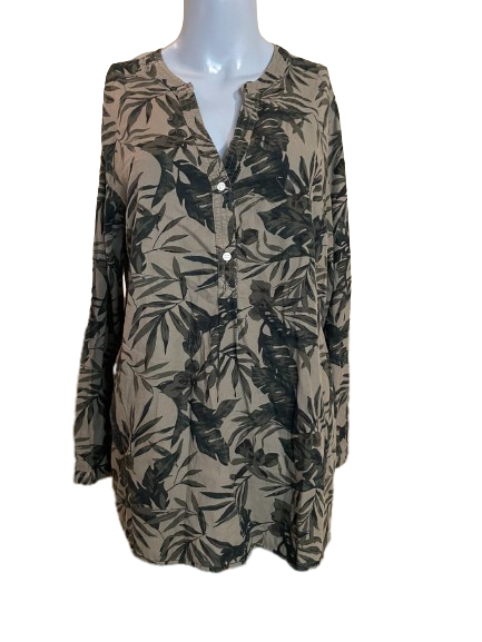 A long sleeve top with a green botanical print, featuring button cuffs and a collar.
