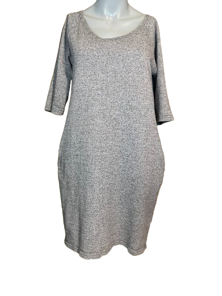A grey sweatshirt dress with side pockets, displayed on a mannequin.