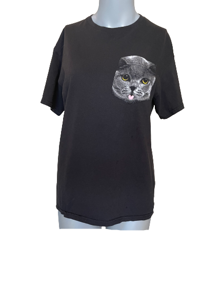 black t-shirt with face of grey cat on front pocket