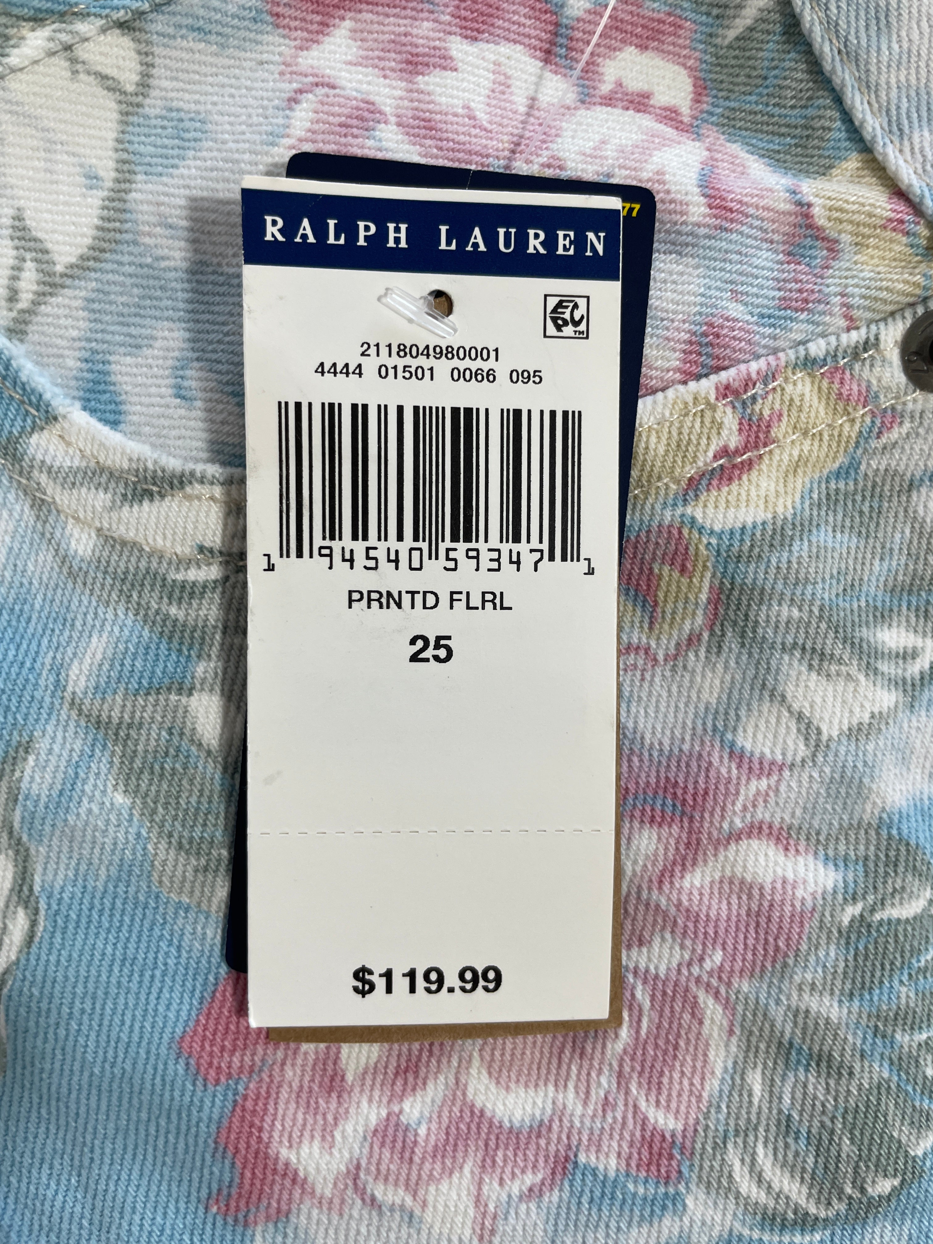 A Ralph Lauren garment tag attached to a floral print fabric, showing the brand name, barcode, size 25, and price $119.99.