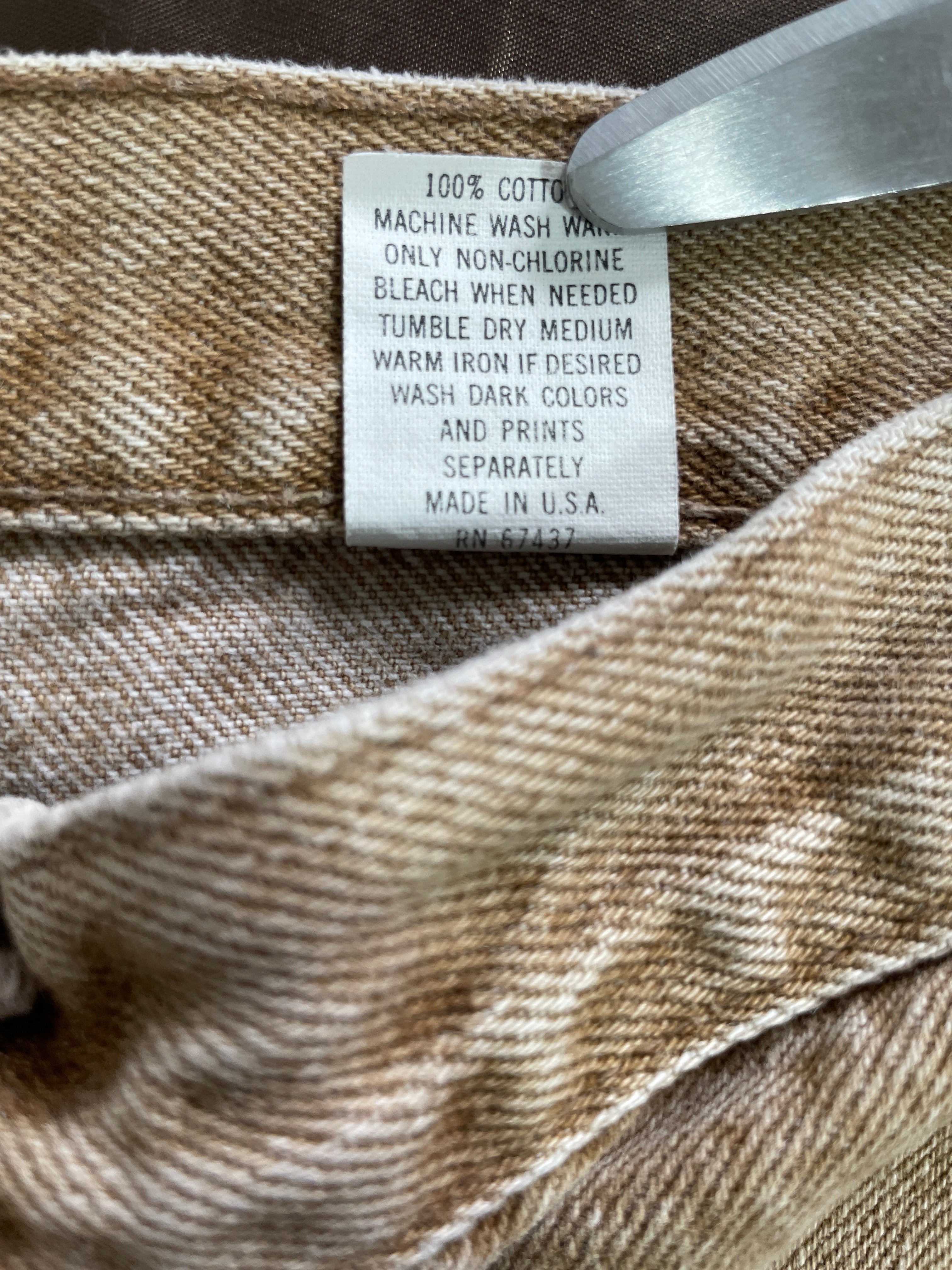 Vintage Bonjour International 100 percent cotton Made in USA jeans care tag