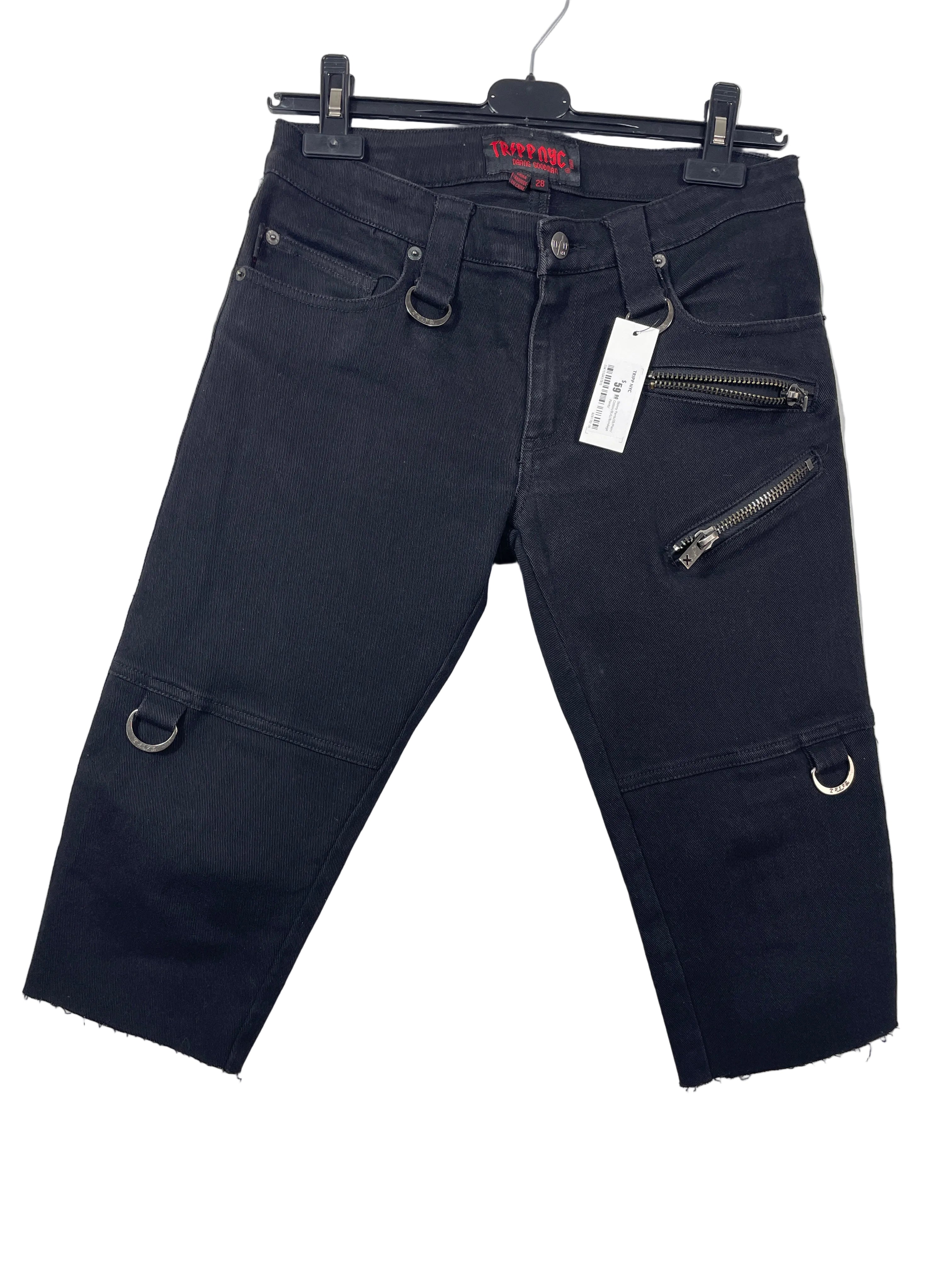 Image 1: Size 28 Tripp NYC black skinny capri pants front view with exposed zippers D-ring hardware and raw hems