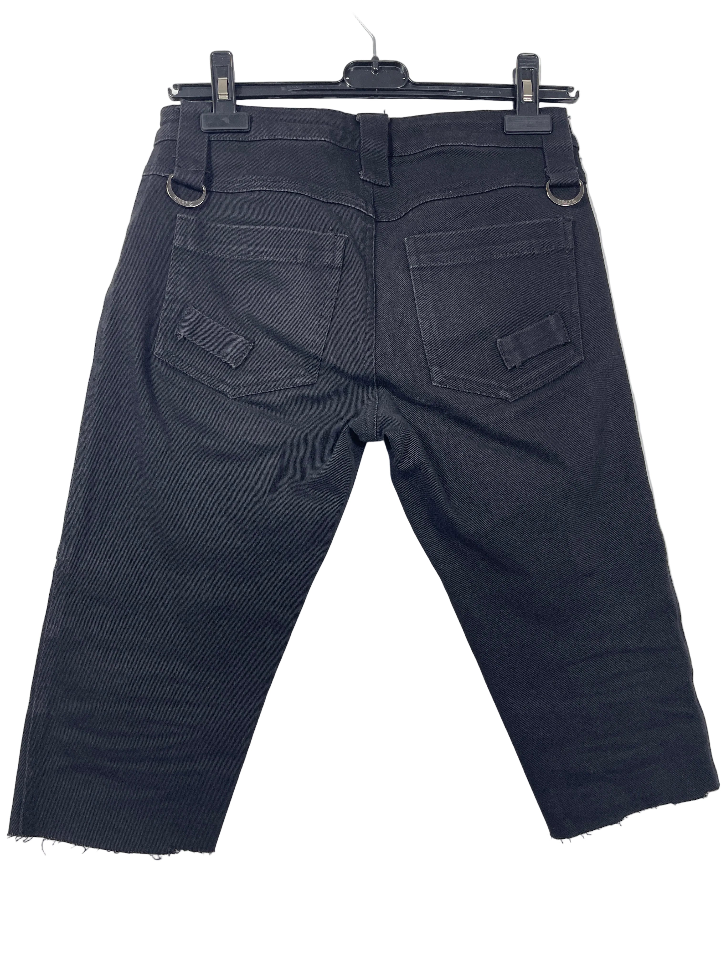 Size 28 Tripp NYC black cropped skinny pants back view with patch pockets and D-ring belt loops