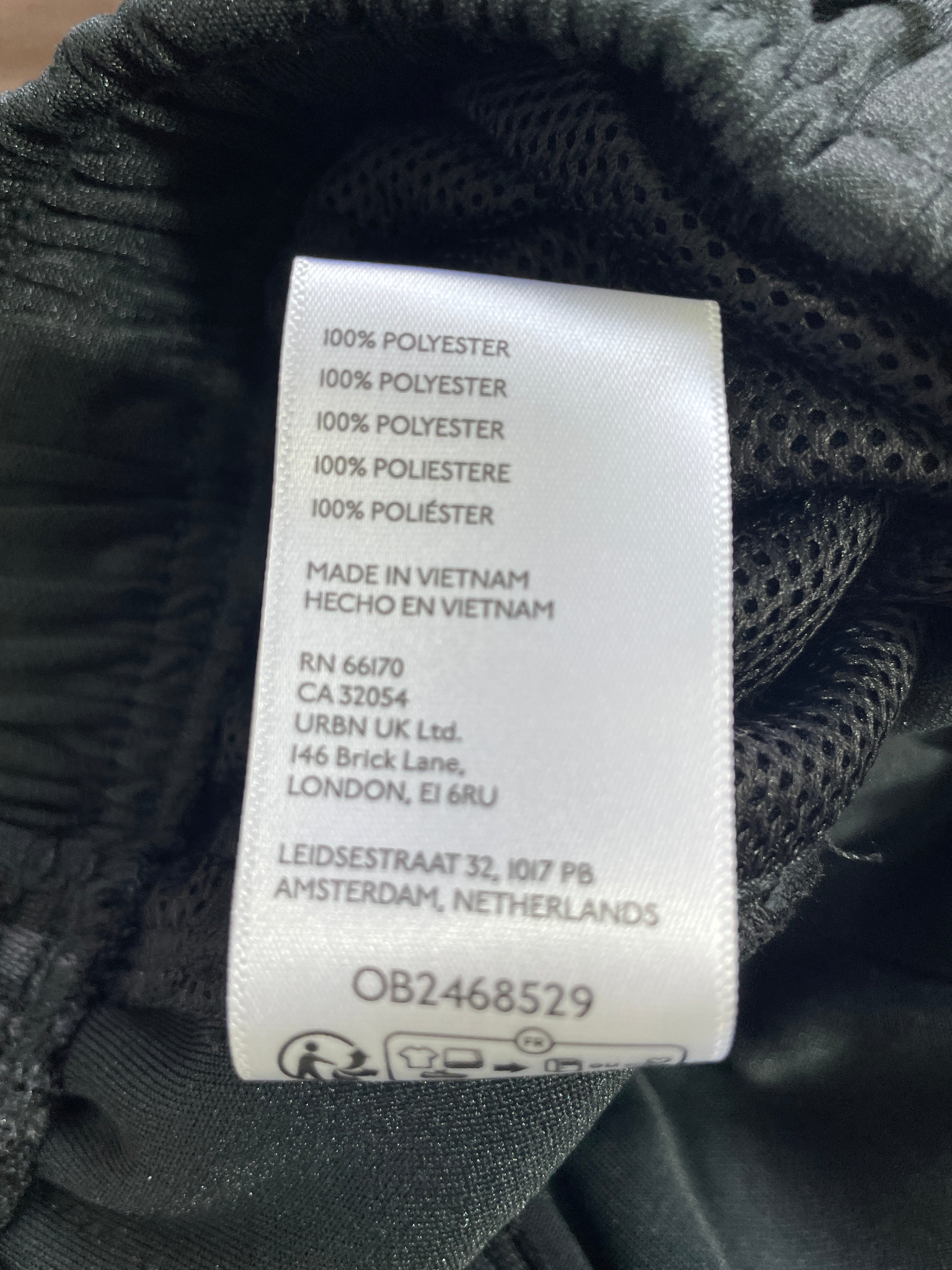 Urban Outfitters black track pants size S 100 percent polyester fabric label