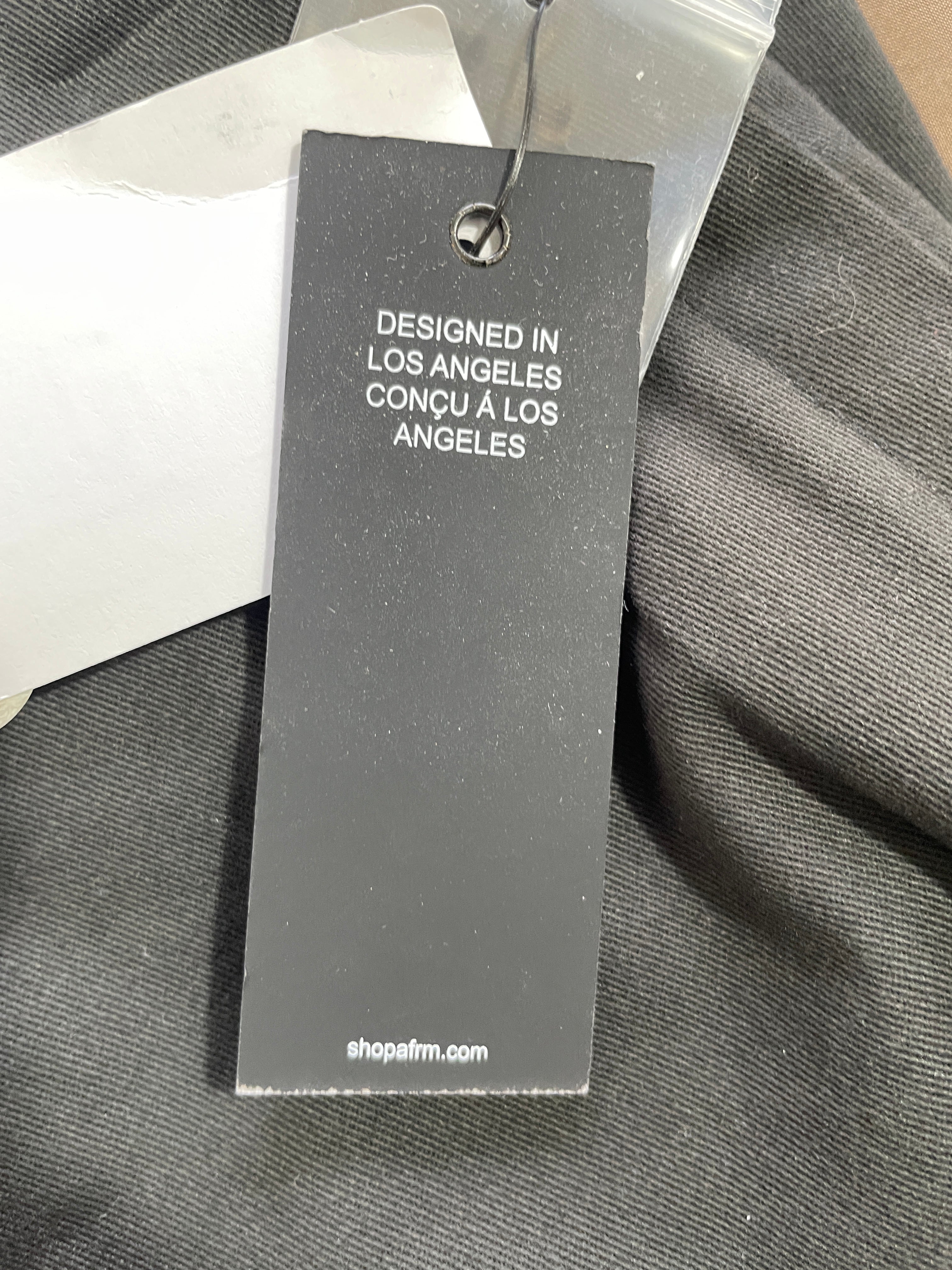 AFRM designed in Los Angeles branded clothing hang tag
