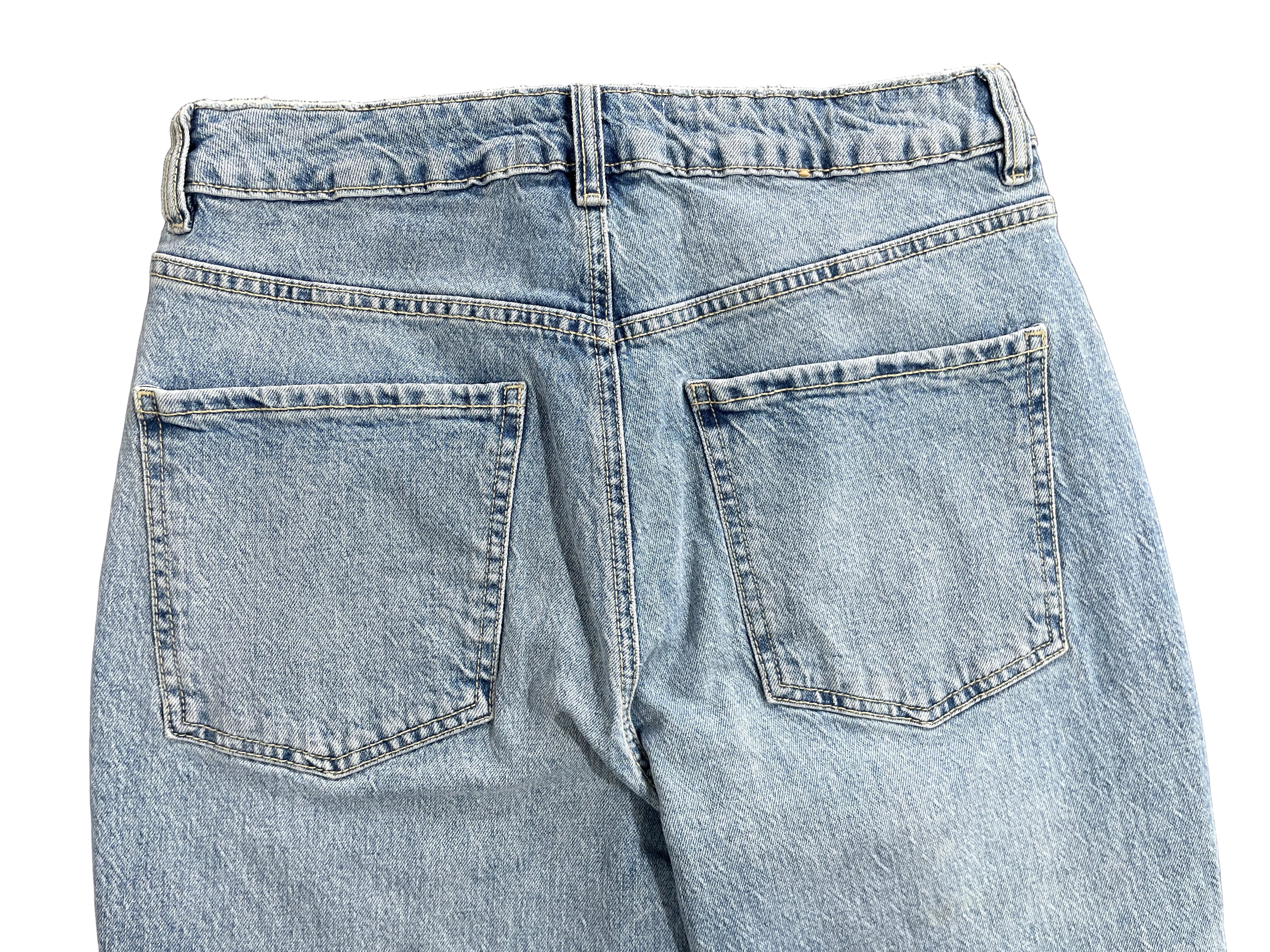 Size 7 Garage light wash blue cropped jeans back patch pockets and denim stitching