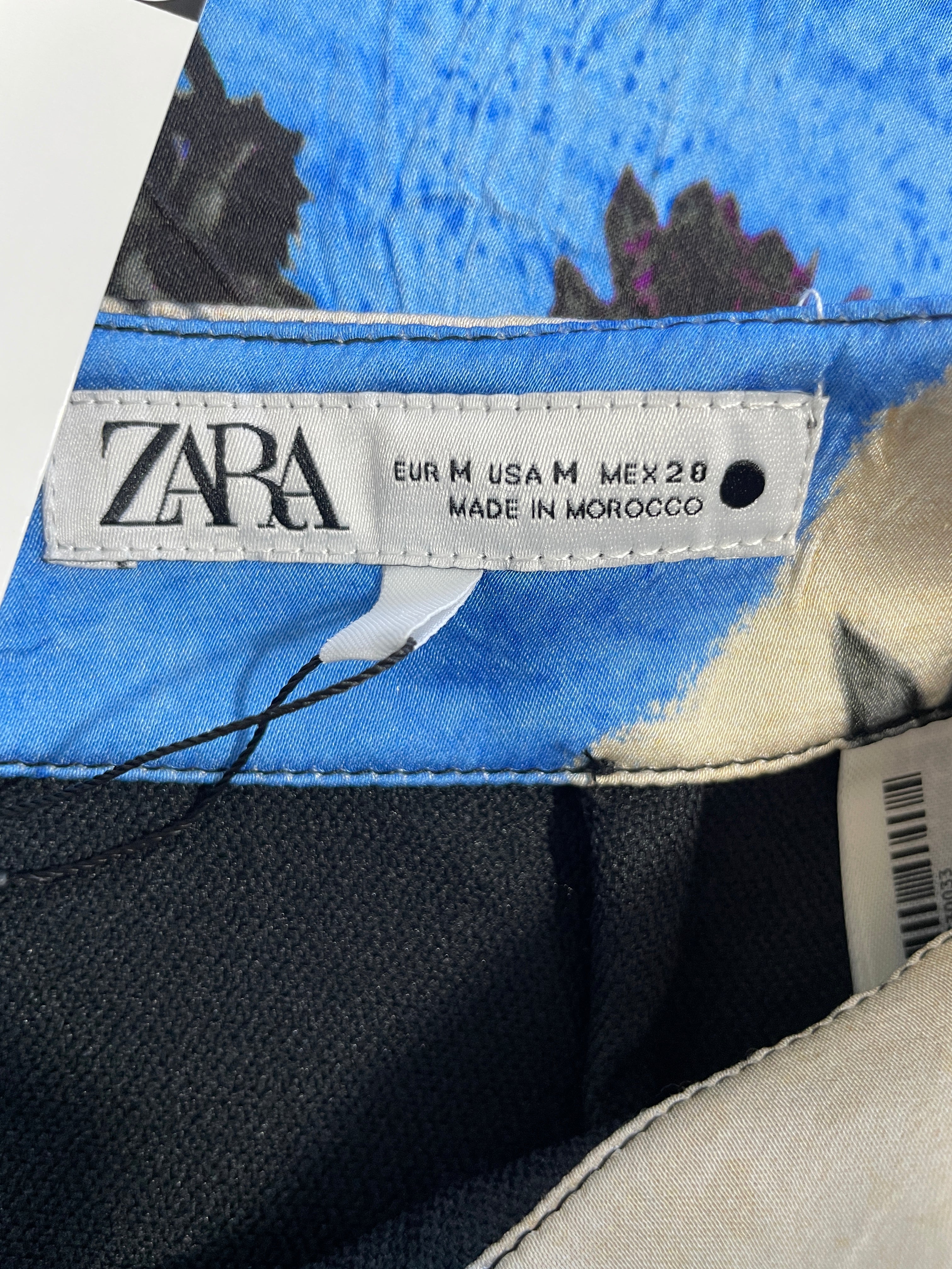 Zara woven brand label showing Medium size and Morocco manufacture