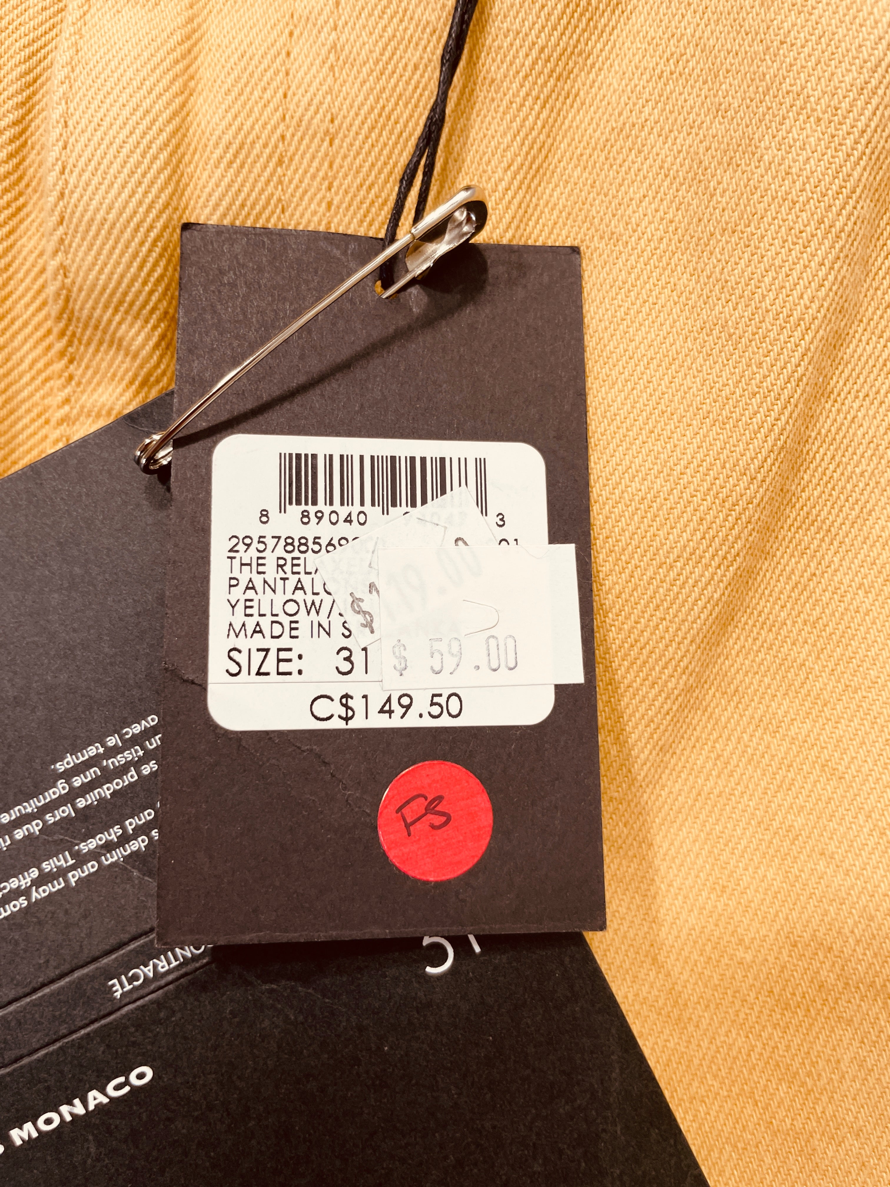 Original Club Monaco jeans retail tag showing size and $149.50 CAD price