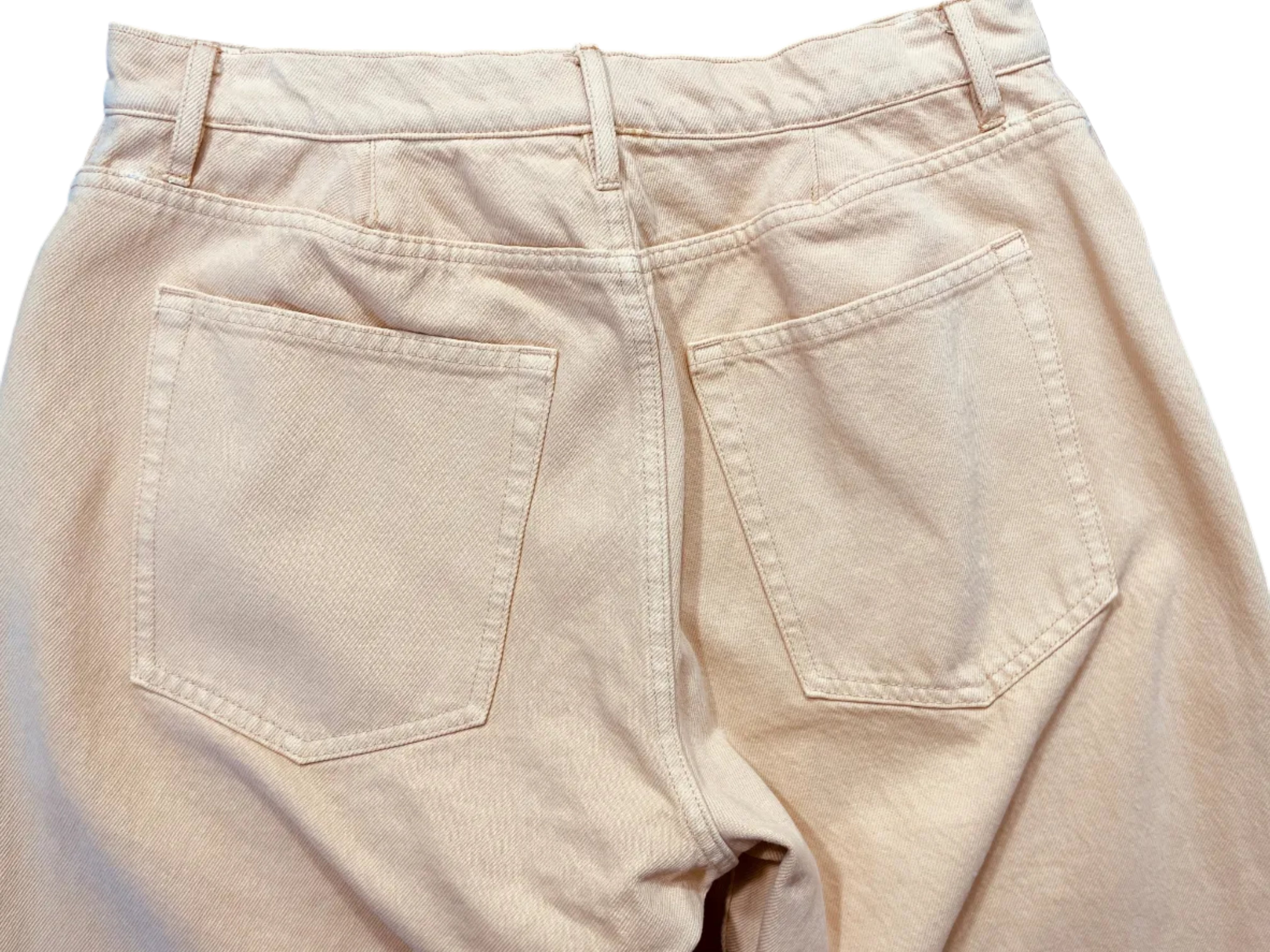 1. Back pockets and belt loops on mustard yellow Club Monaco cotton jeans