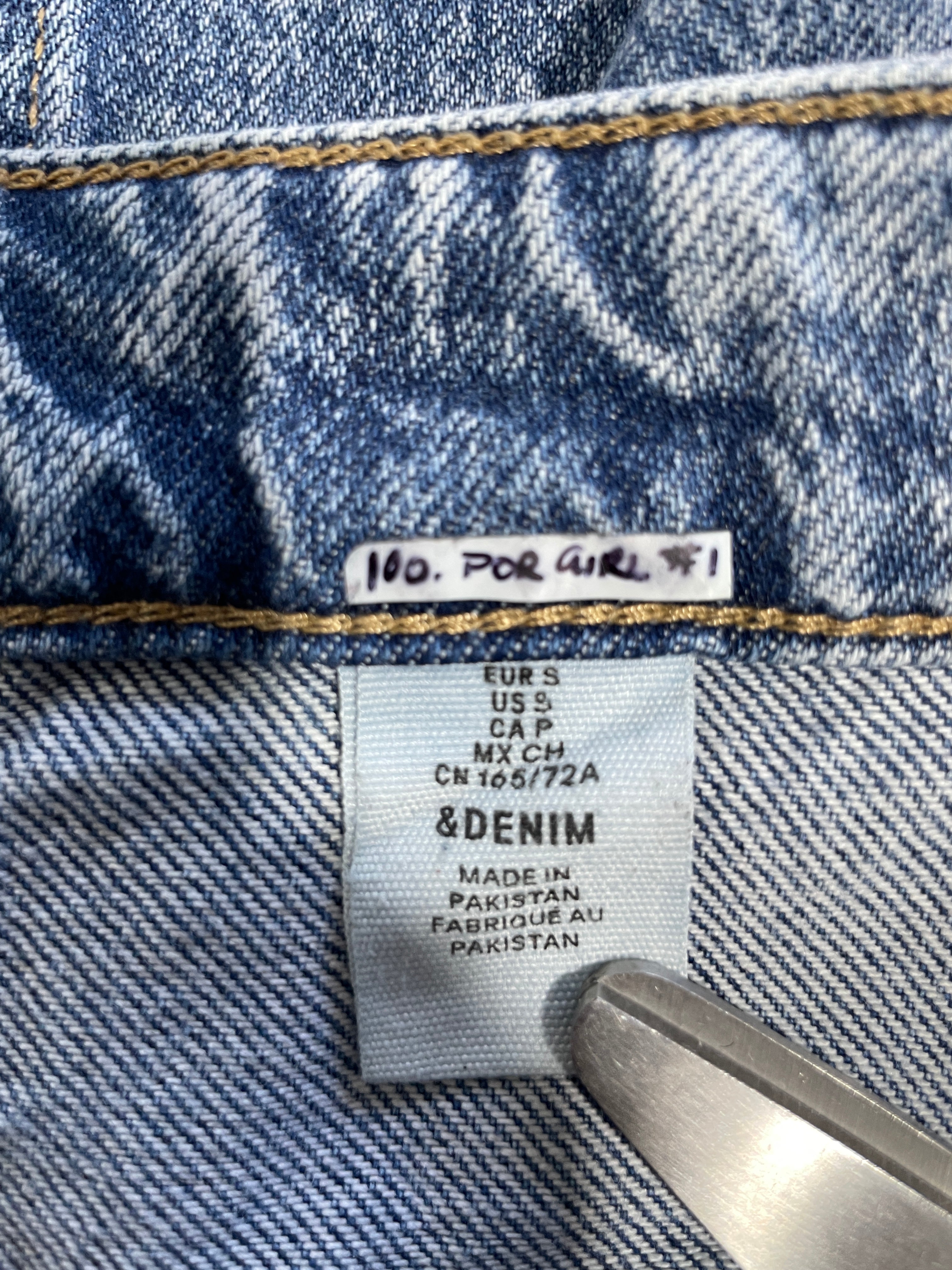H&M &Denim size US 9 clothing label with Yellowjackets wardrobe identification sticker