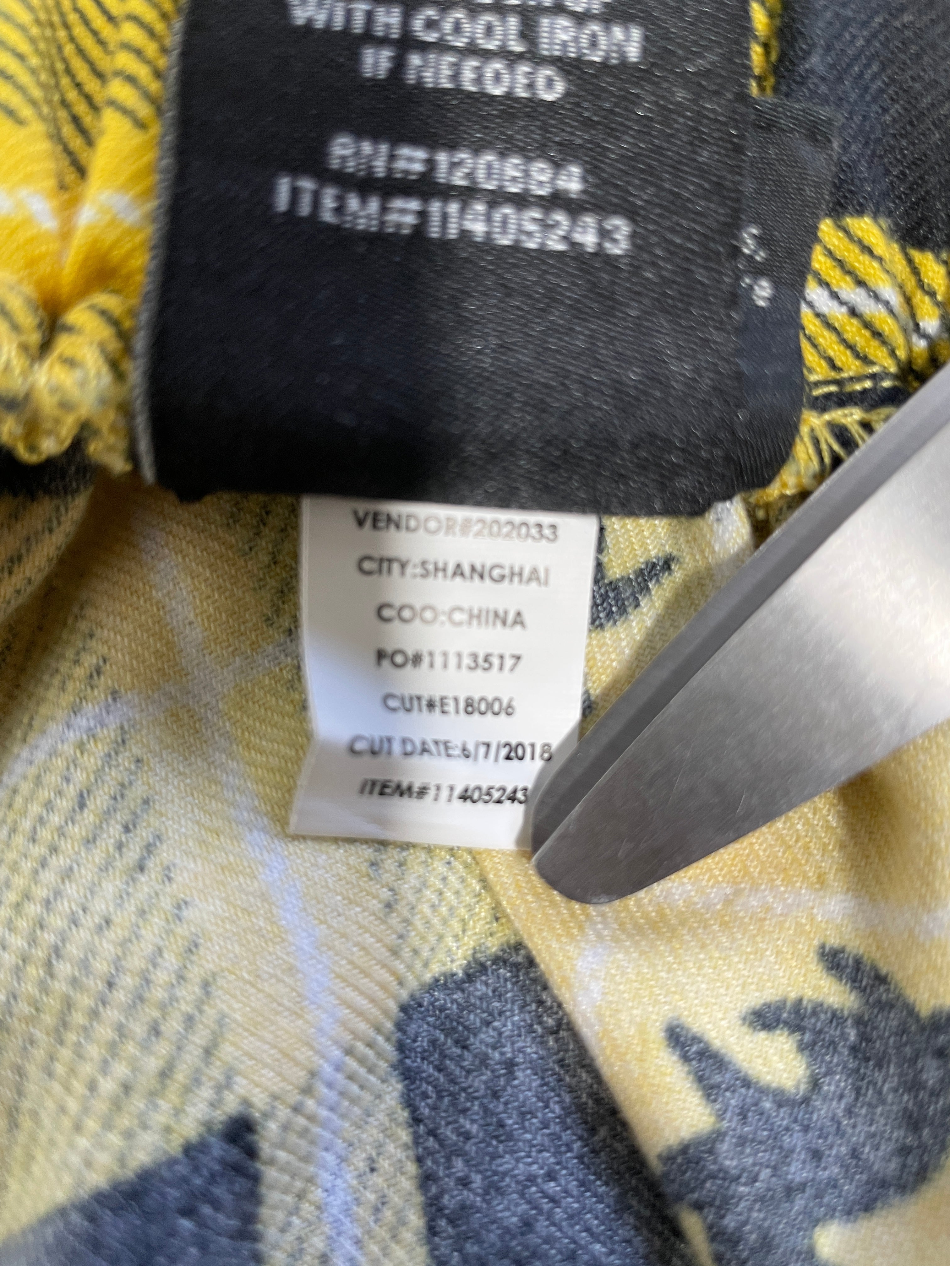 1. Harry Potter Hufflepuff skirt product number and 2018 manufacturing date label