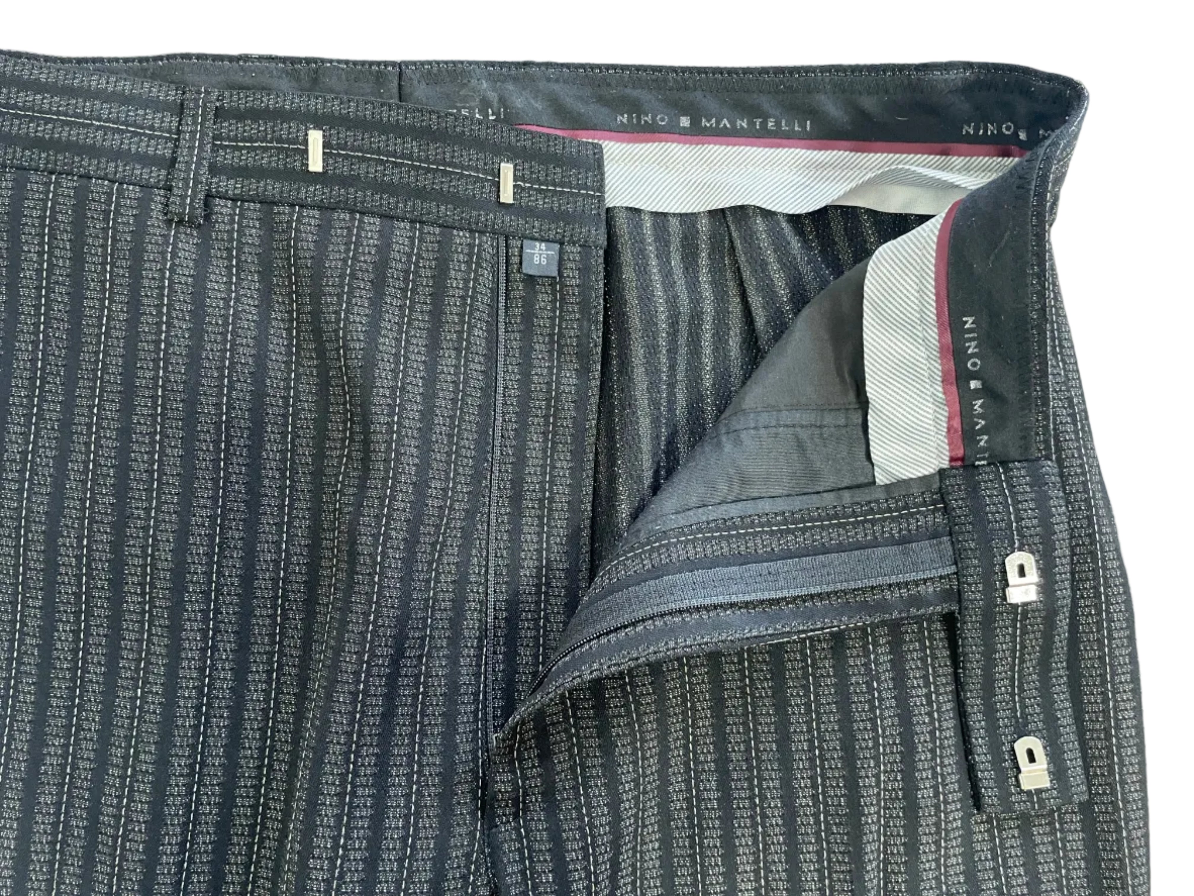 Nino Mantelli men's tailored dress pants interior waistband and double clasp closure